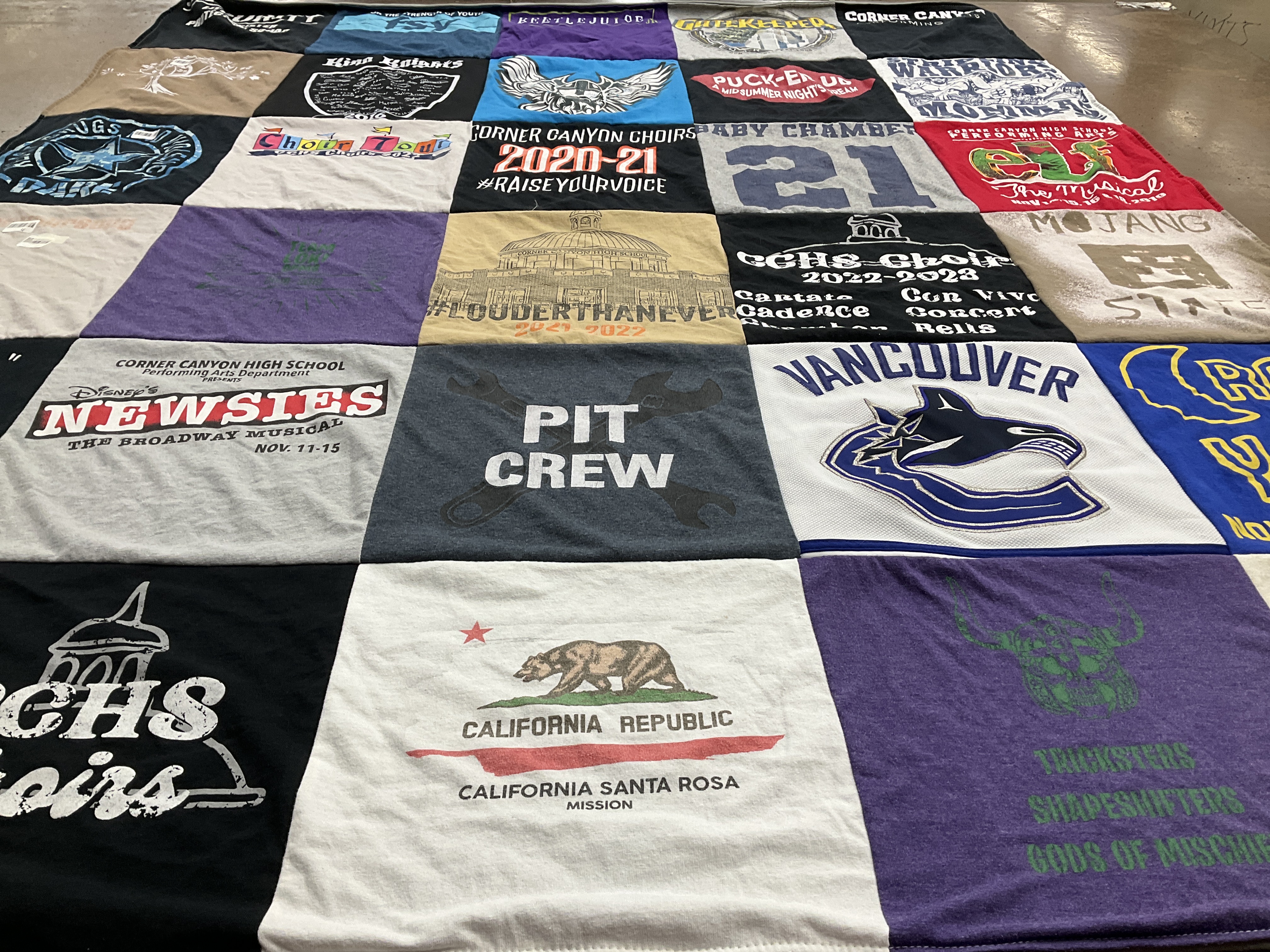Custom Project Repat t-shirt quilt featuring shirts from corner canyon high school.