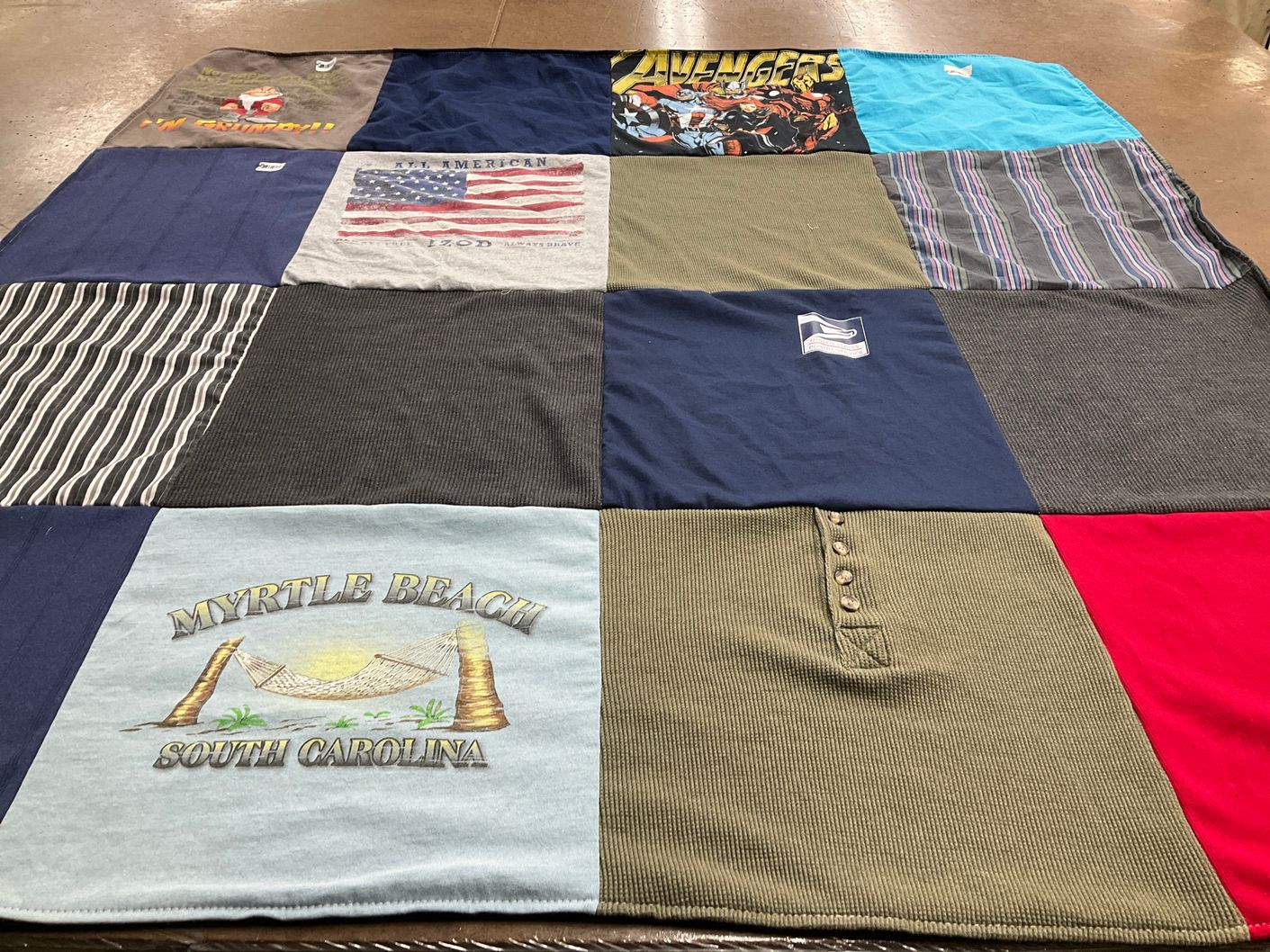 T-shirt quilt with comic books, travel themes by Emily from NJ