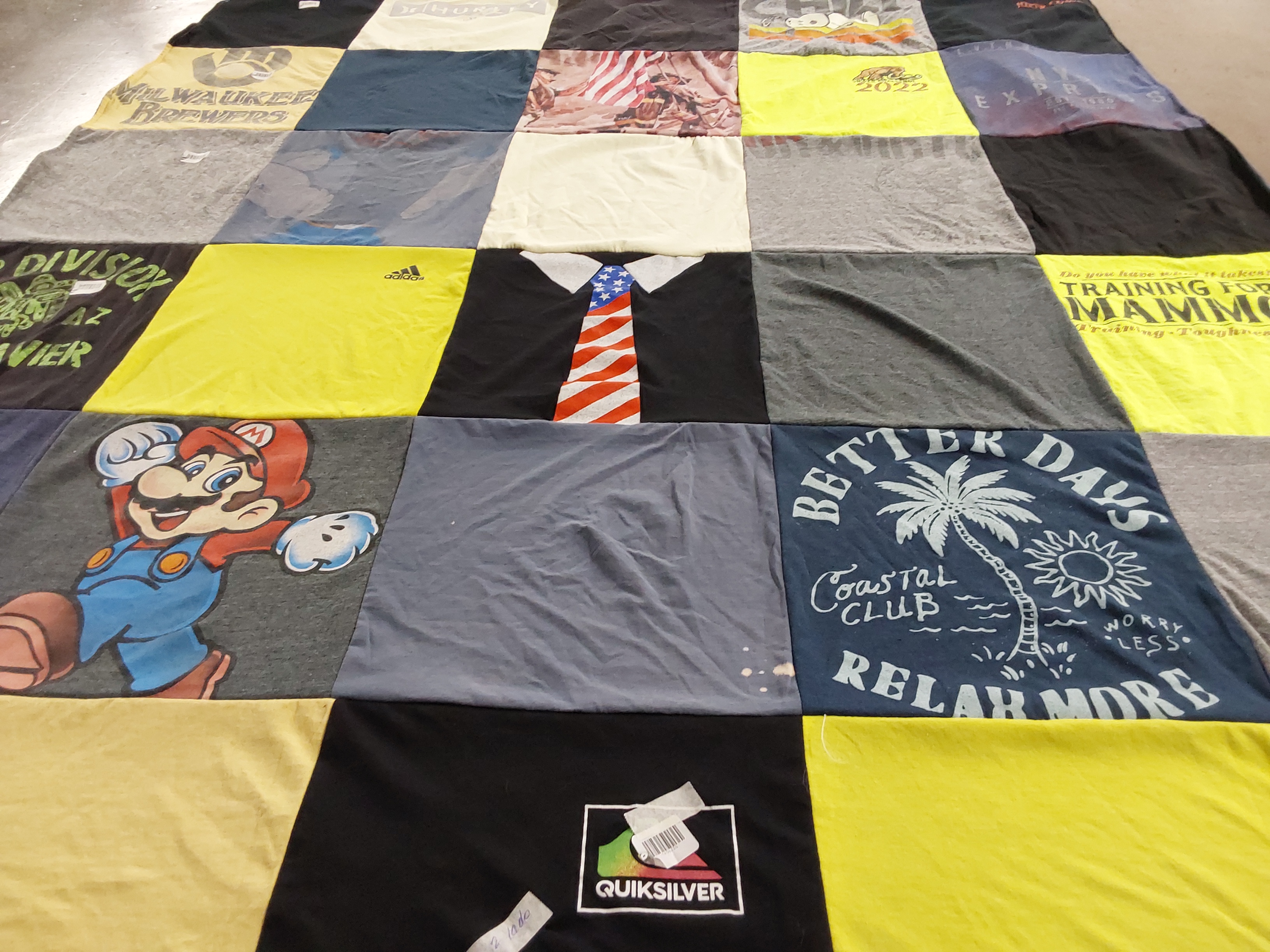 T-shirt quilt with sports, gaming themes by Charlotte from NJ