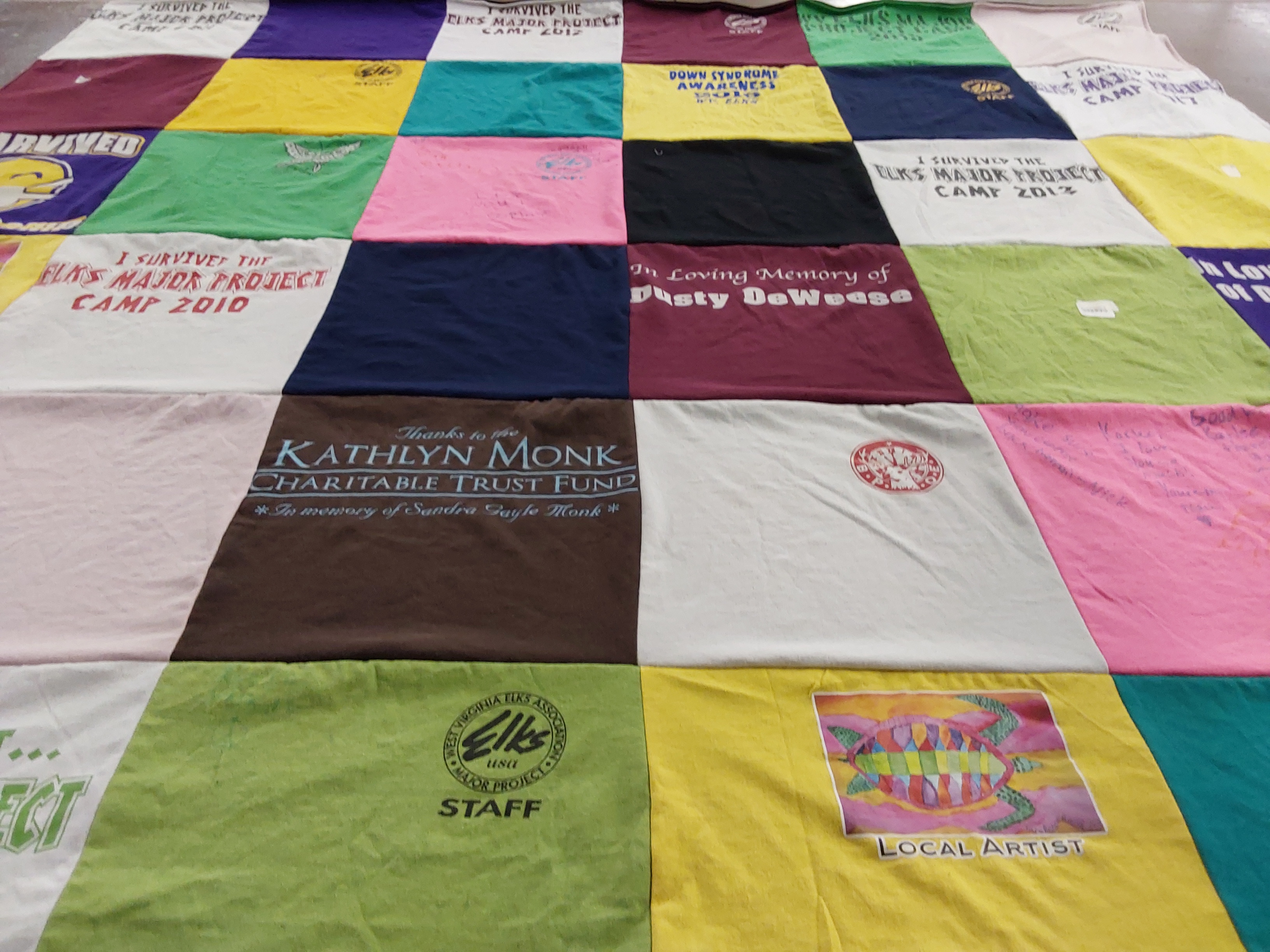 T-shirt quilt with community projects, awareness themes by Kimberly from NC