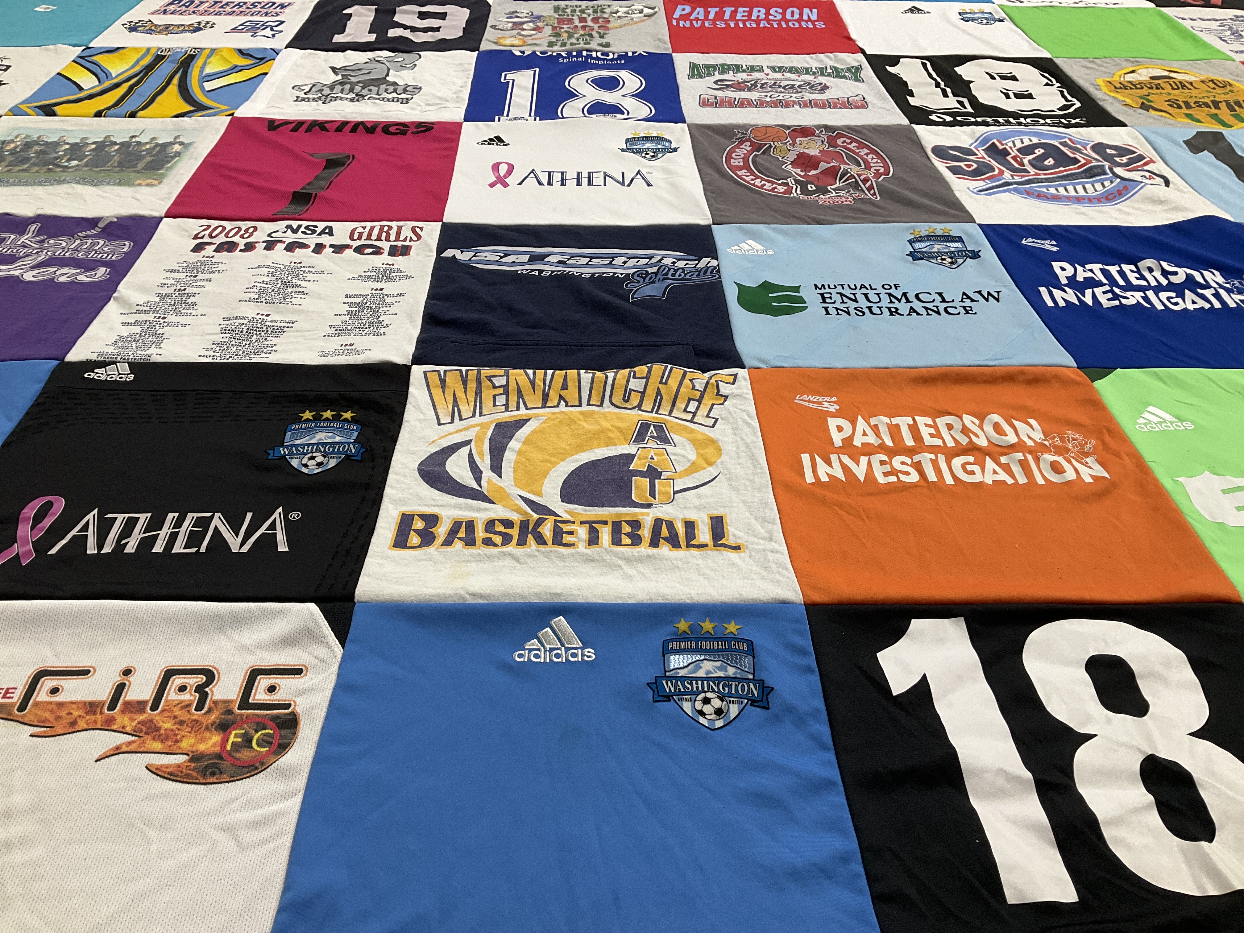 T-shirt quilt featuring wenatchee aa basketball, fire fc by KRISTINE from WA