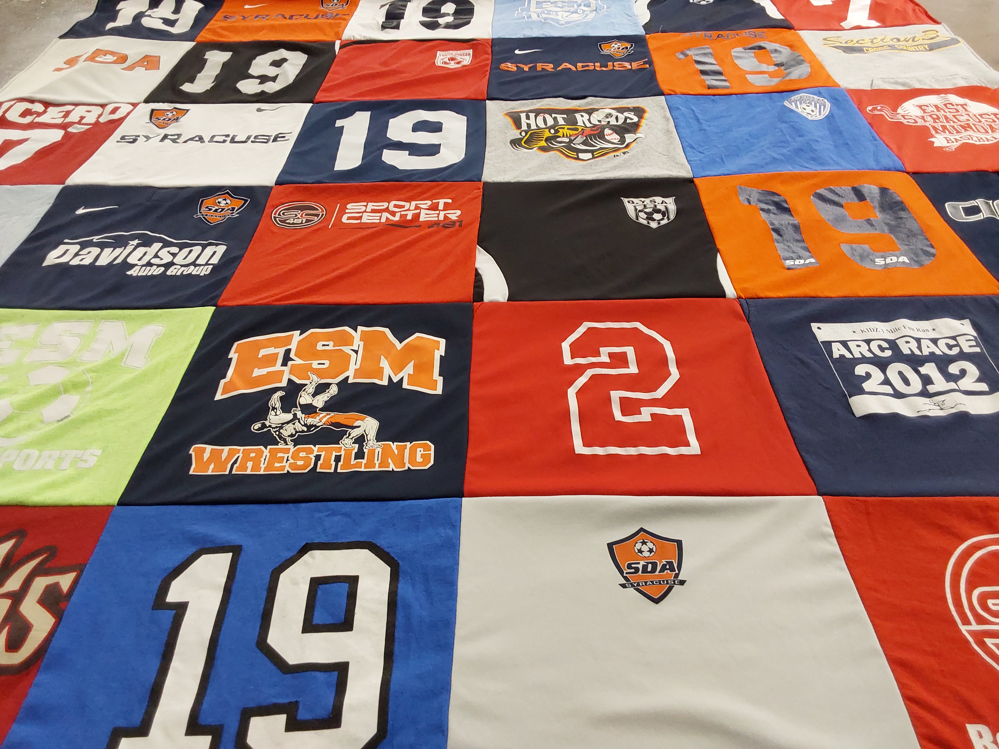 T-shirt quilt featuring east syracuse meadows sports team by Tammy from NY