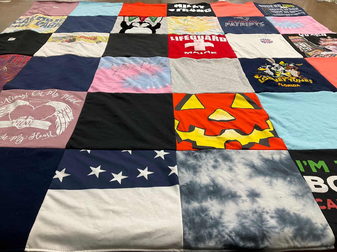 T-shirt quilt with sports, halloween themes by Michelle from NH