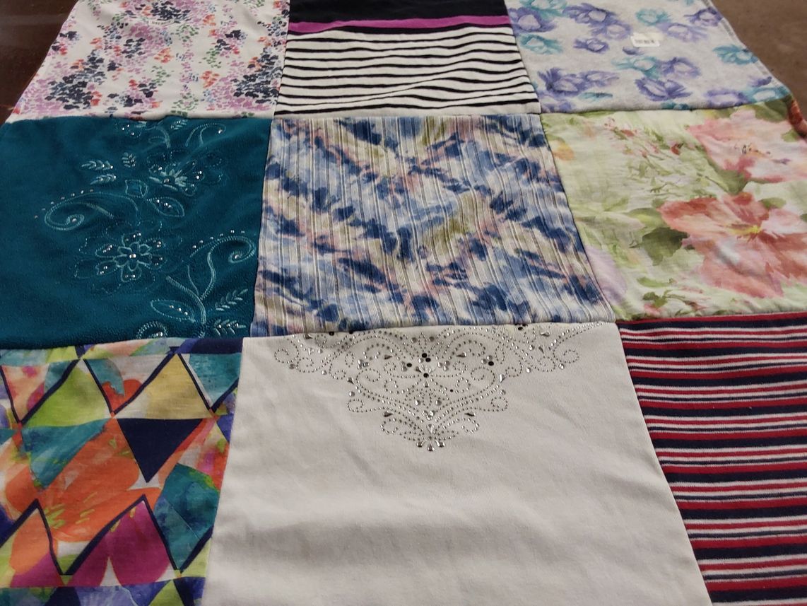 T-shirt quilt with sewing, textiles themes by Laura from NJ