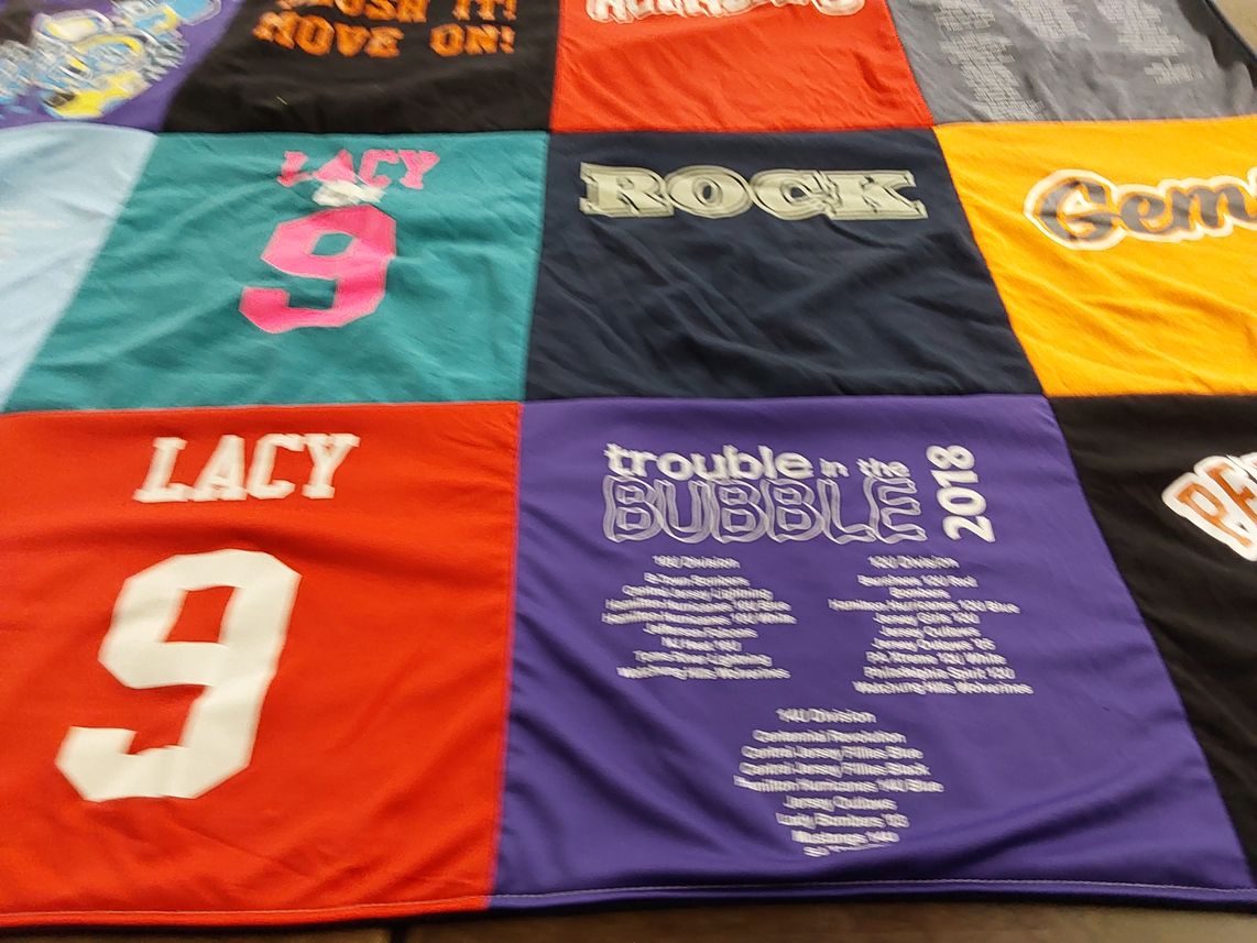 T-shirt quilt with sports themes by Amanda from NJ