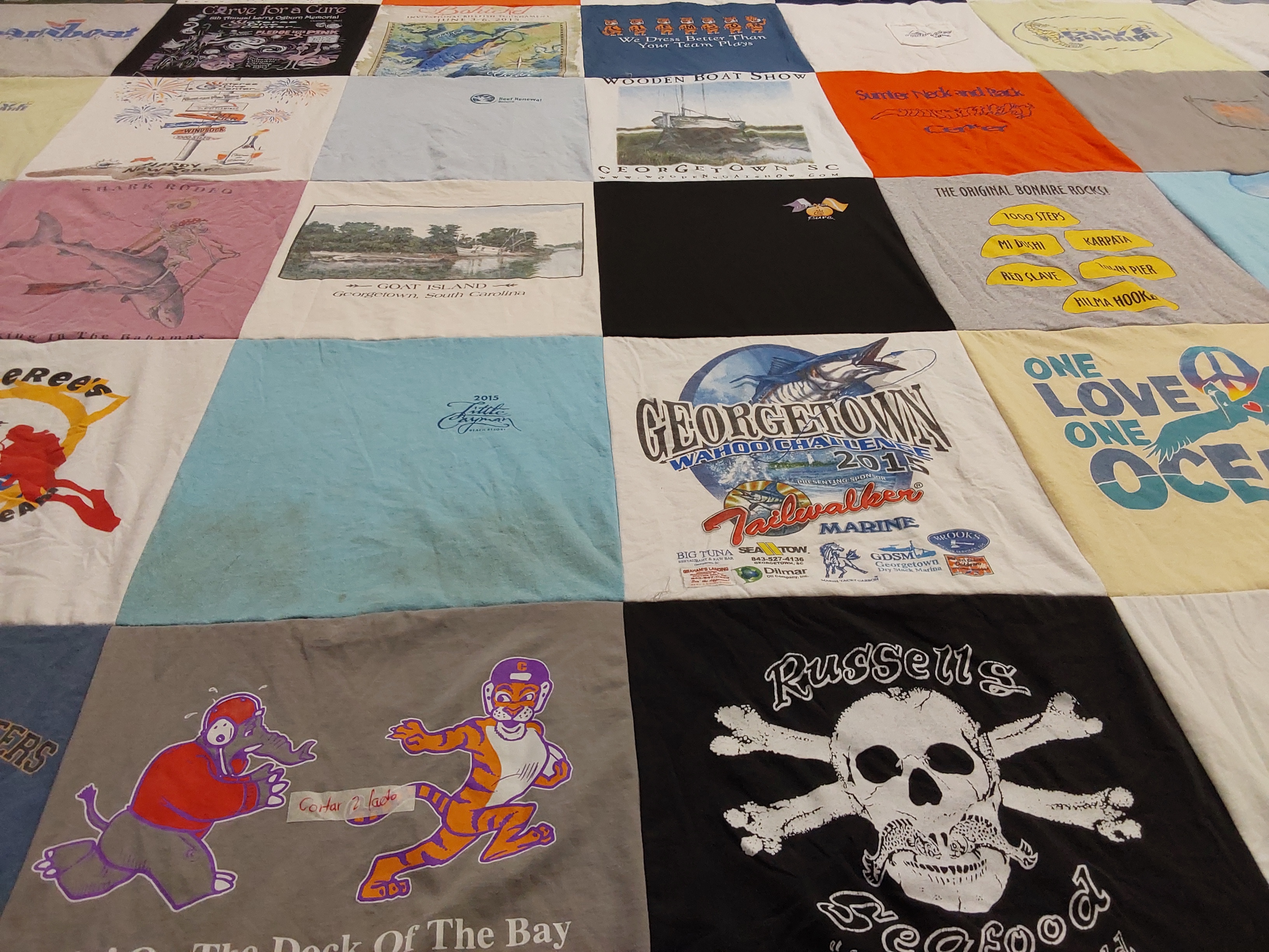 T-shirt quilt with fishing, marine life themes by John from SC