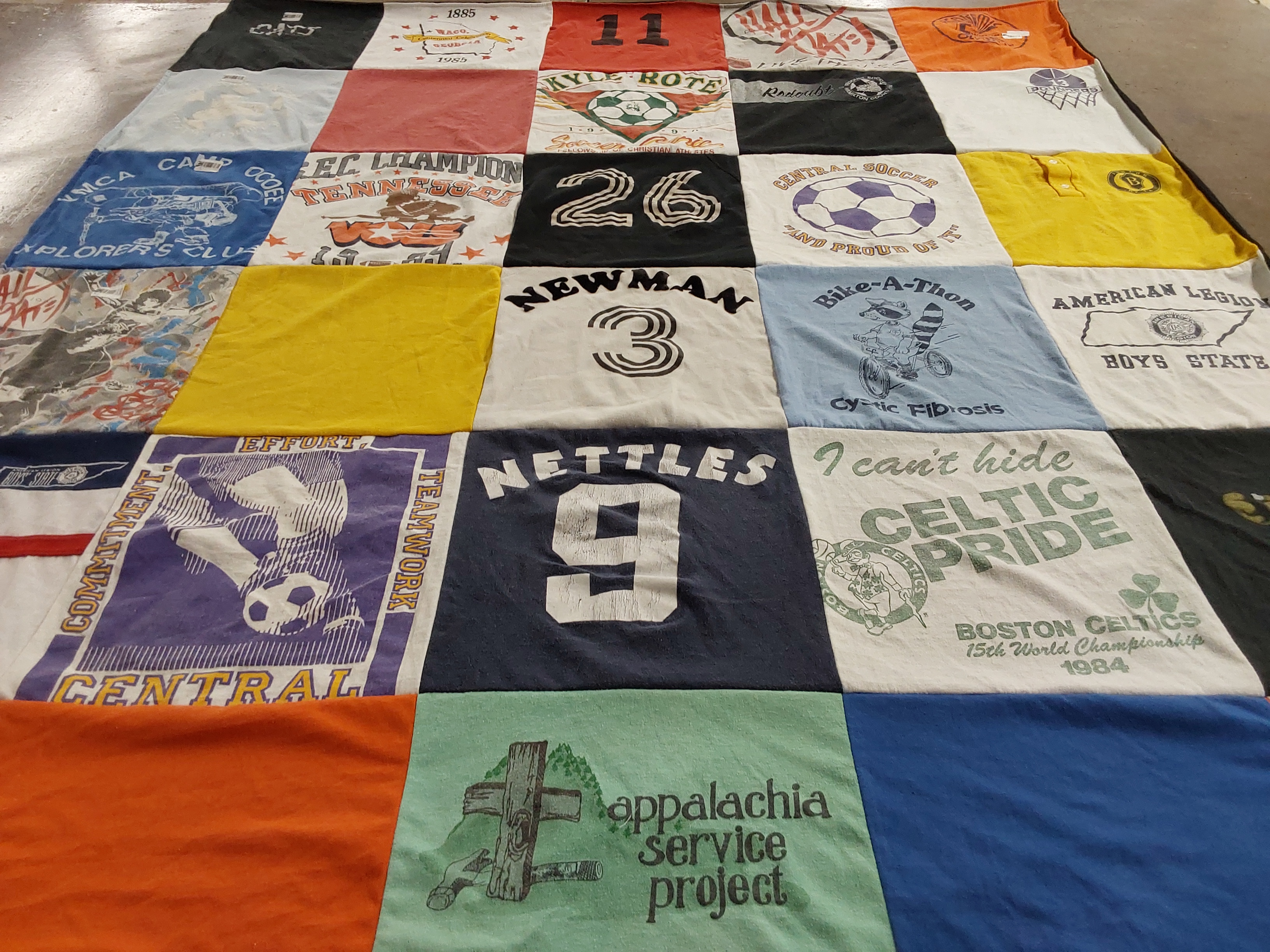 Custom Project Repat t-shirt quilt with boston celtics team logos.