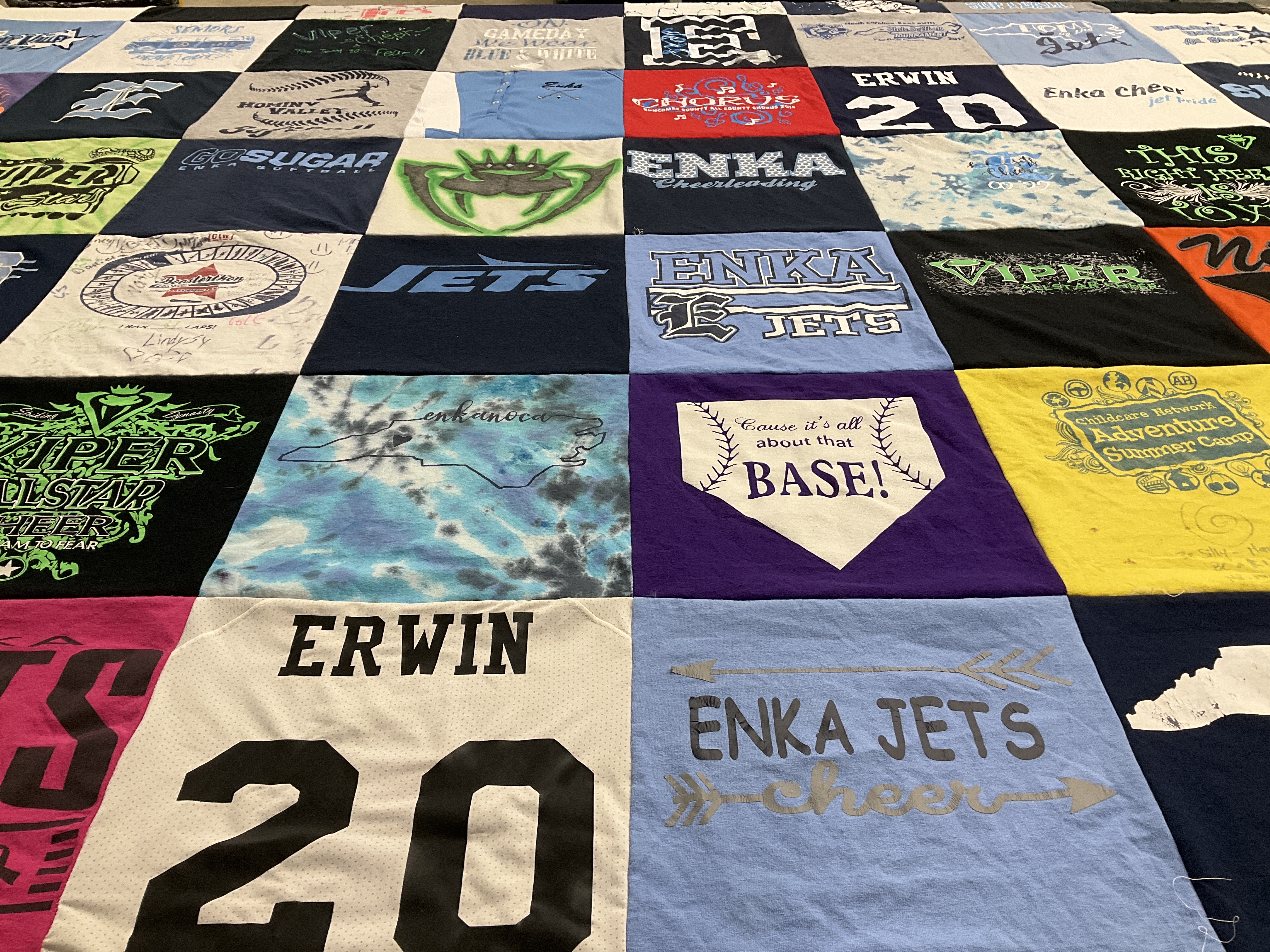 Custom Project Repat t-shirt quilt featuring shirts from enka high school.