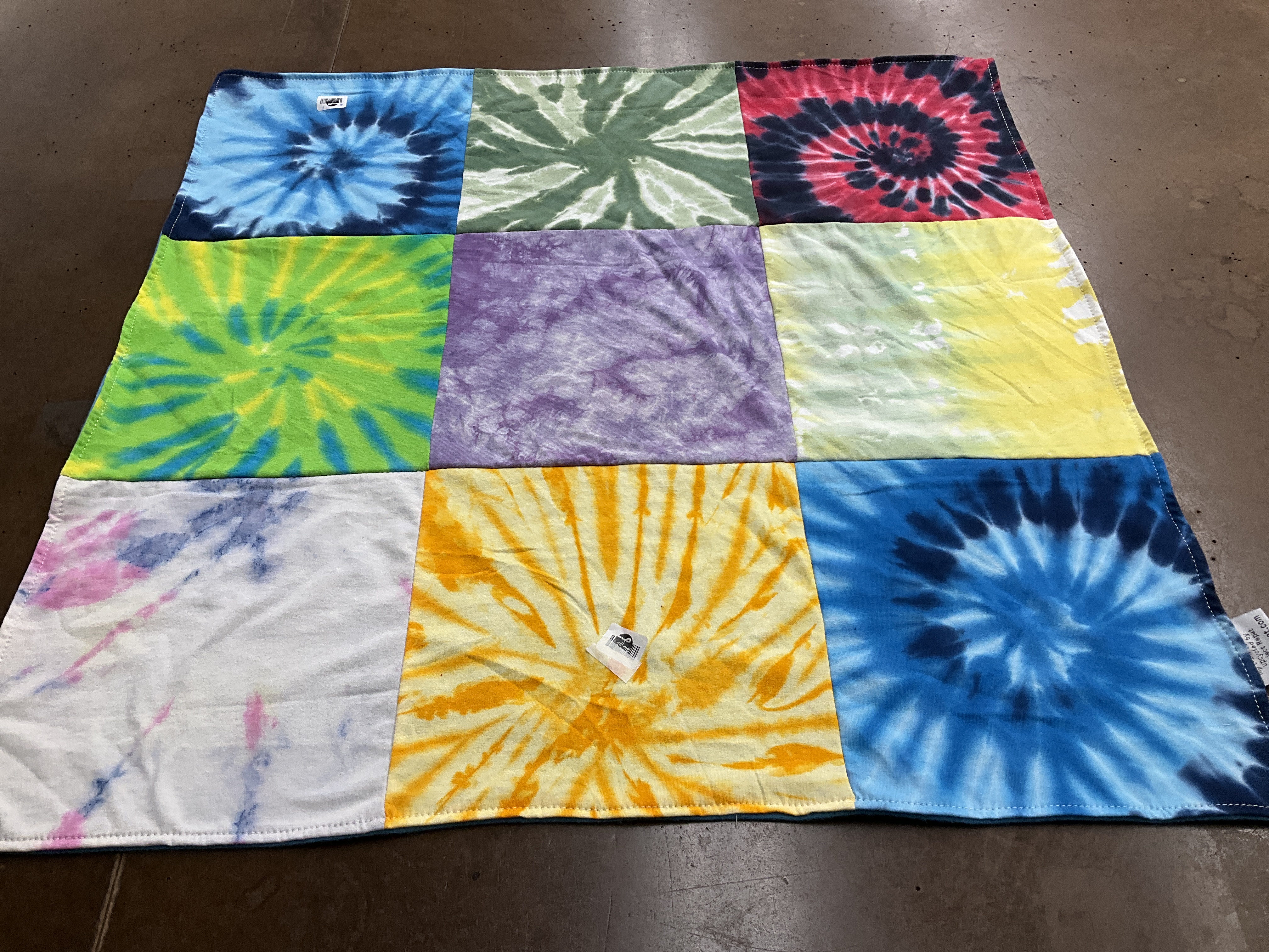T-shirt quilt with tie dye themes by Linda from NC