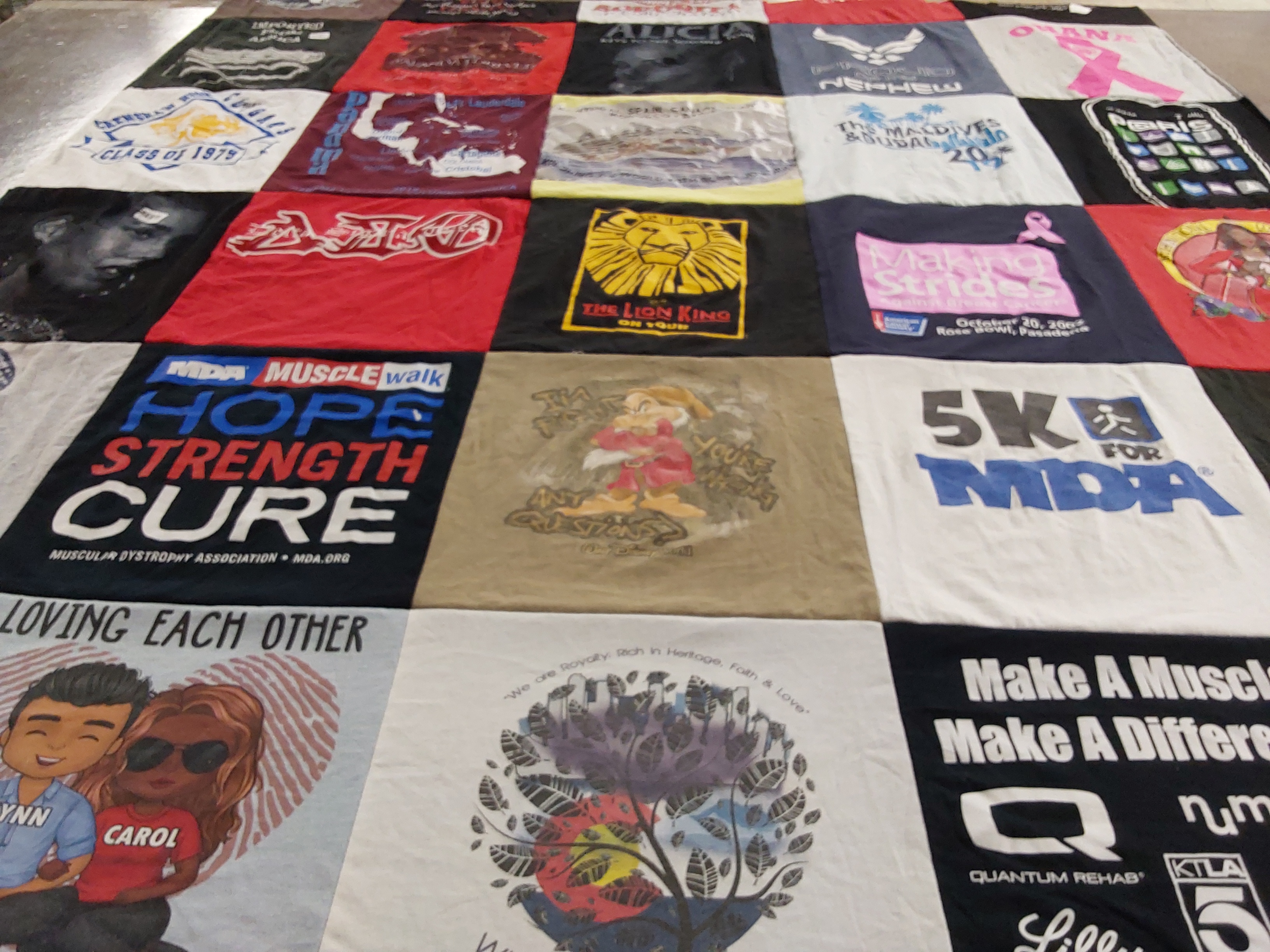 Custom Project Repat t-shirt quilt featuring shirts from class of 1975 university.