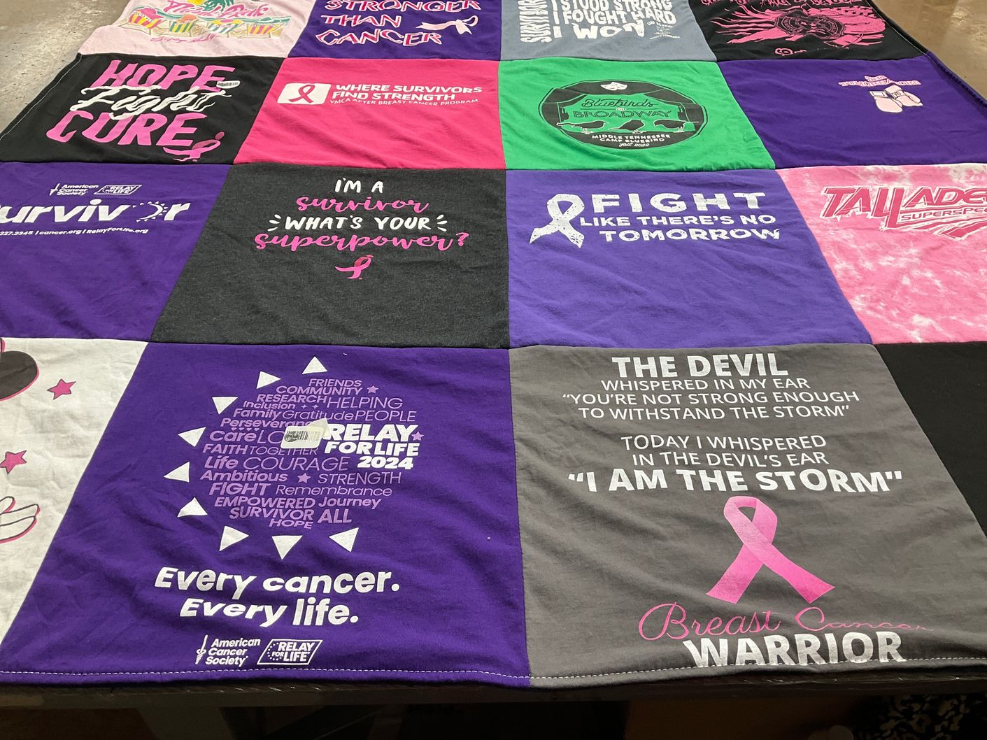 T-shirt quilt with breast cancer awareness, survivorship themes by Elizabeth from TN
