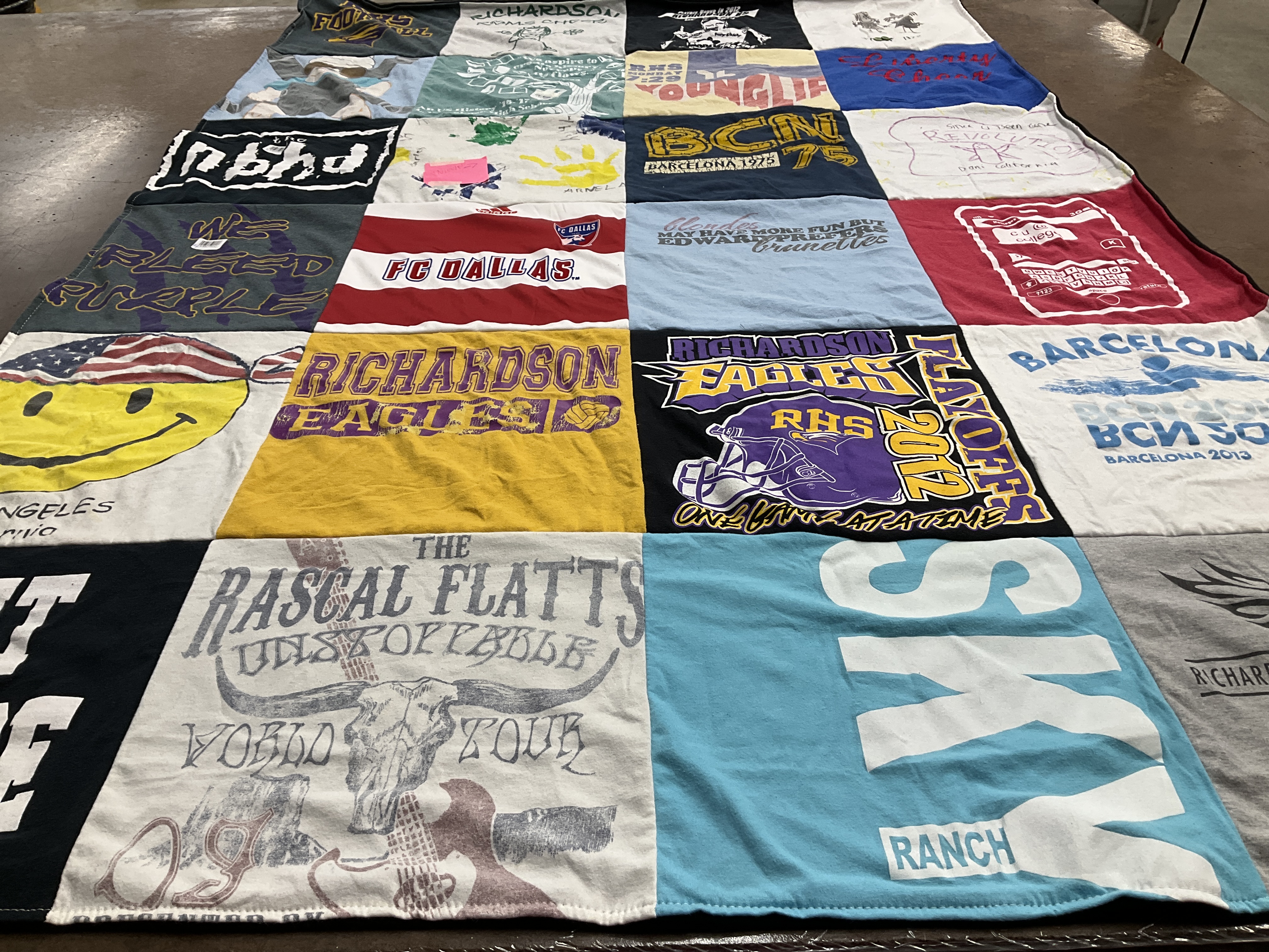 Custom Project Repat t-shirt quilt featuring shirts from richardson high school.