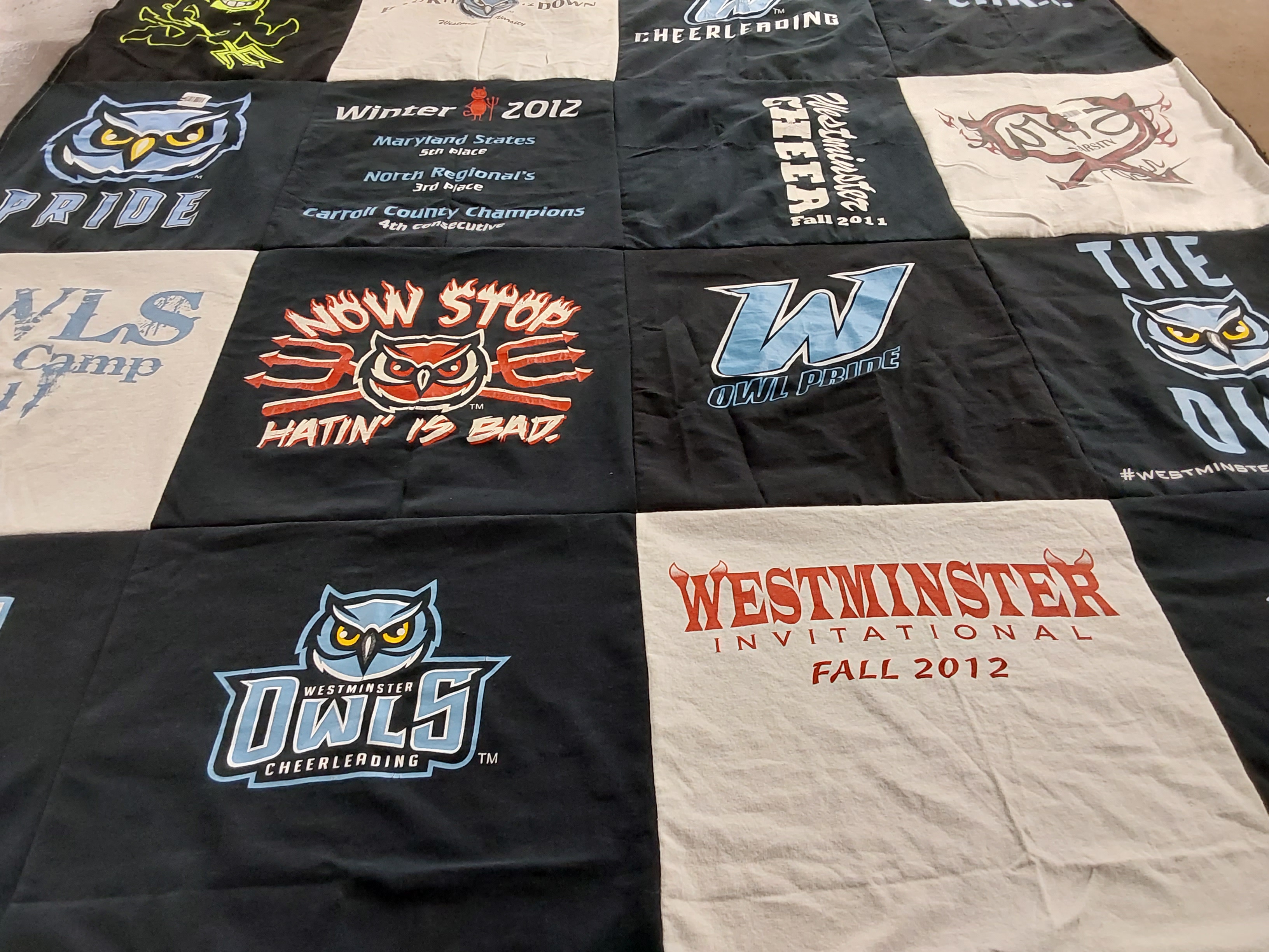 Custom Project Repat t-shirt quilt featuring shirts from westminster university.