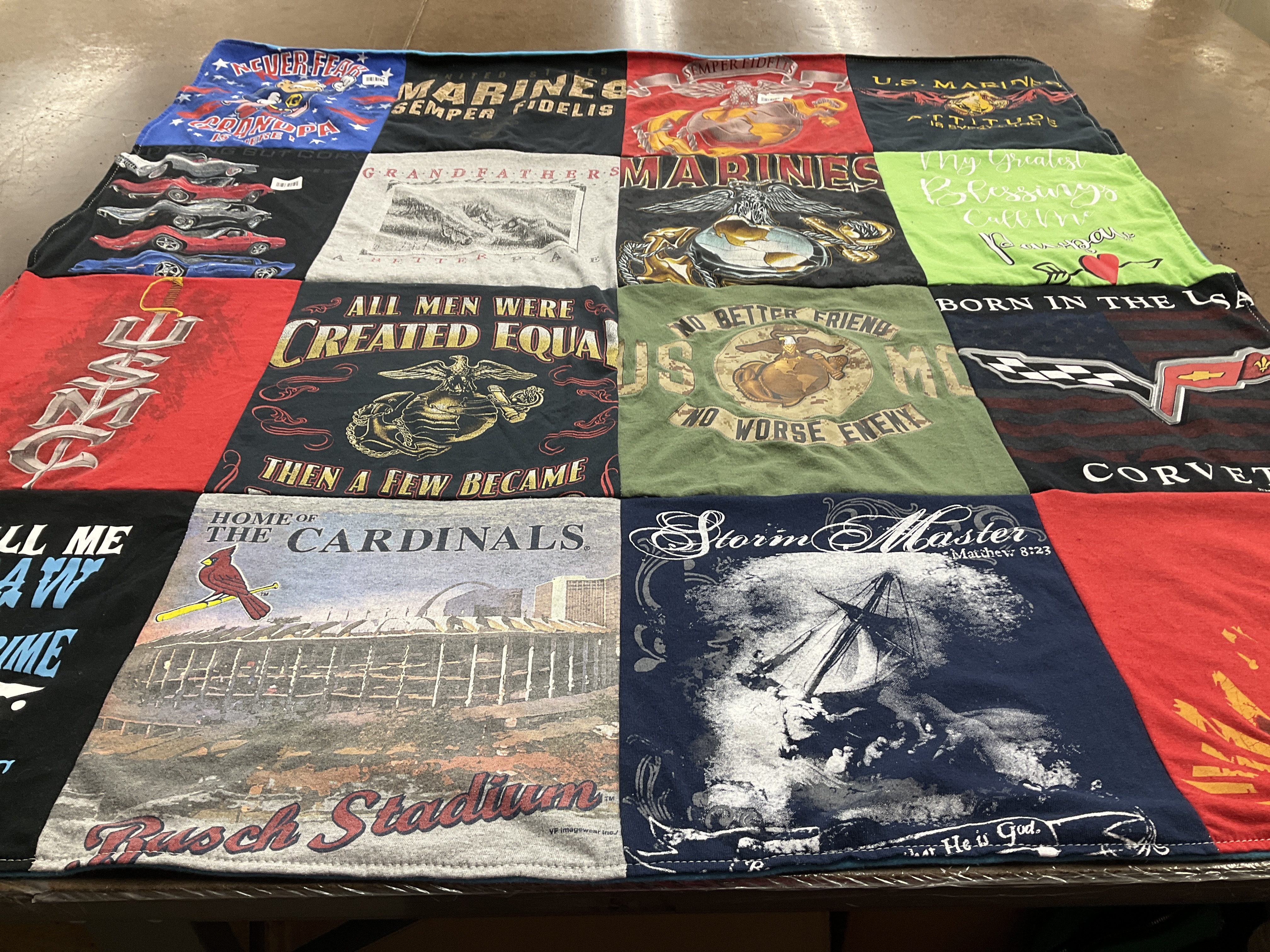 Custom Project Repat t-shirt quilt with cardinals team logos.