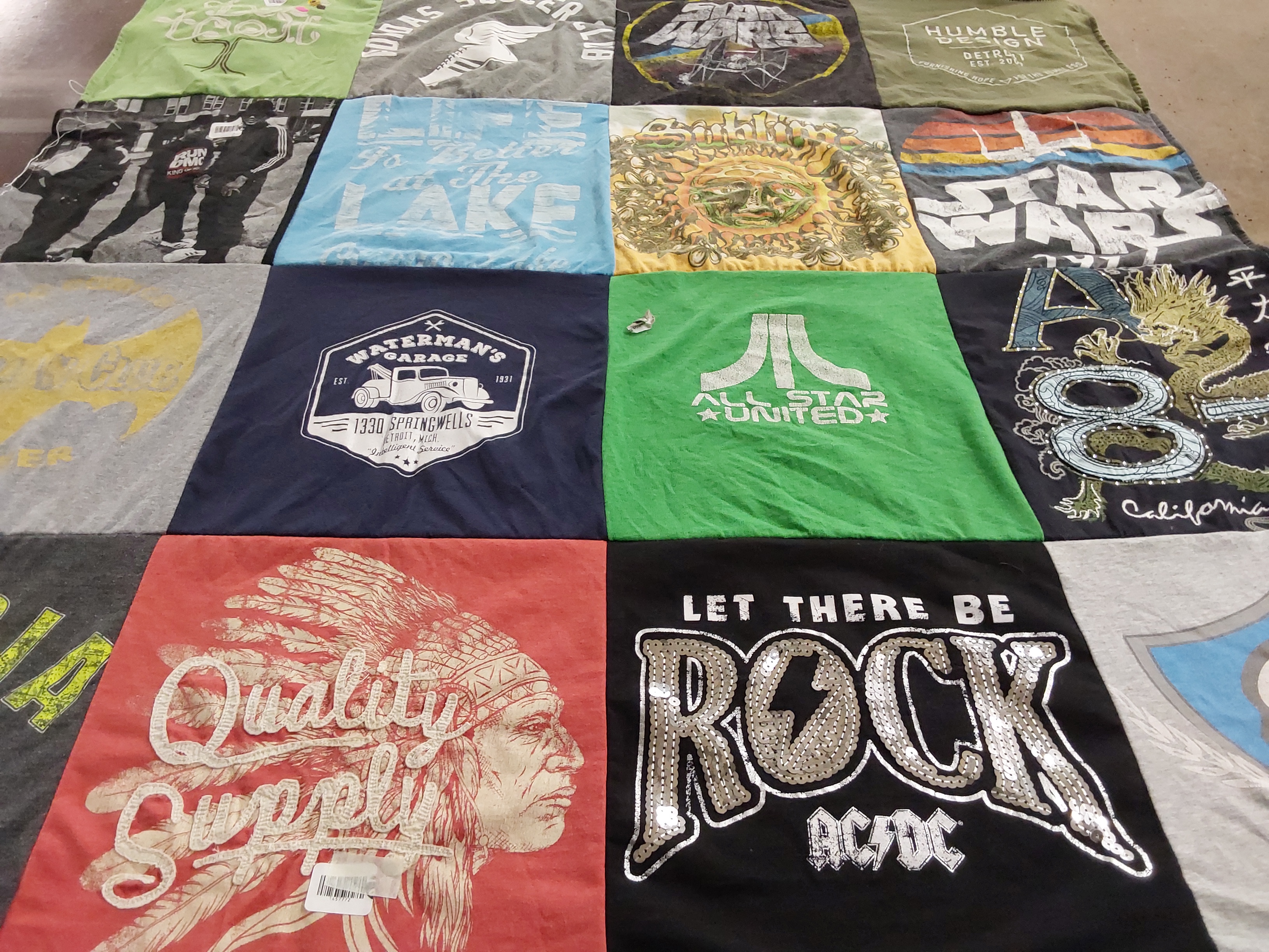 Custom Project Repat t-shirt quilt highlighting music, cars themes.