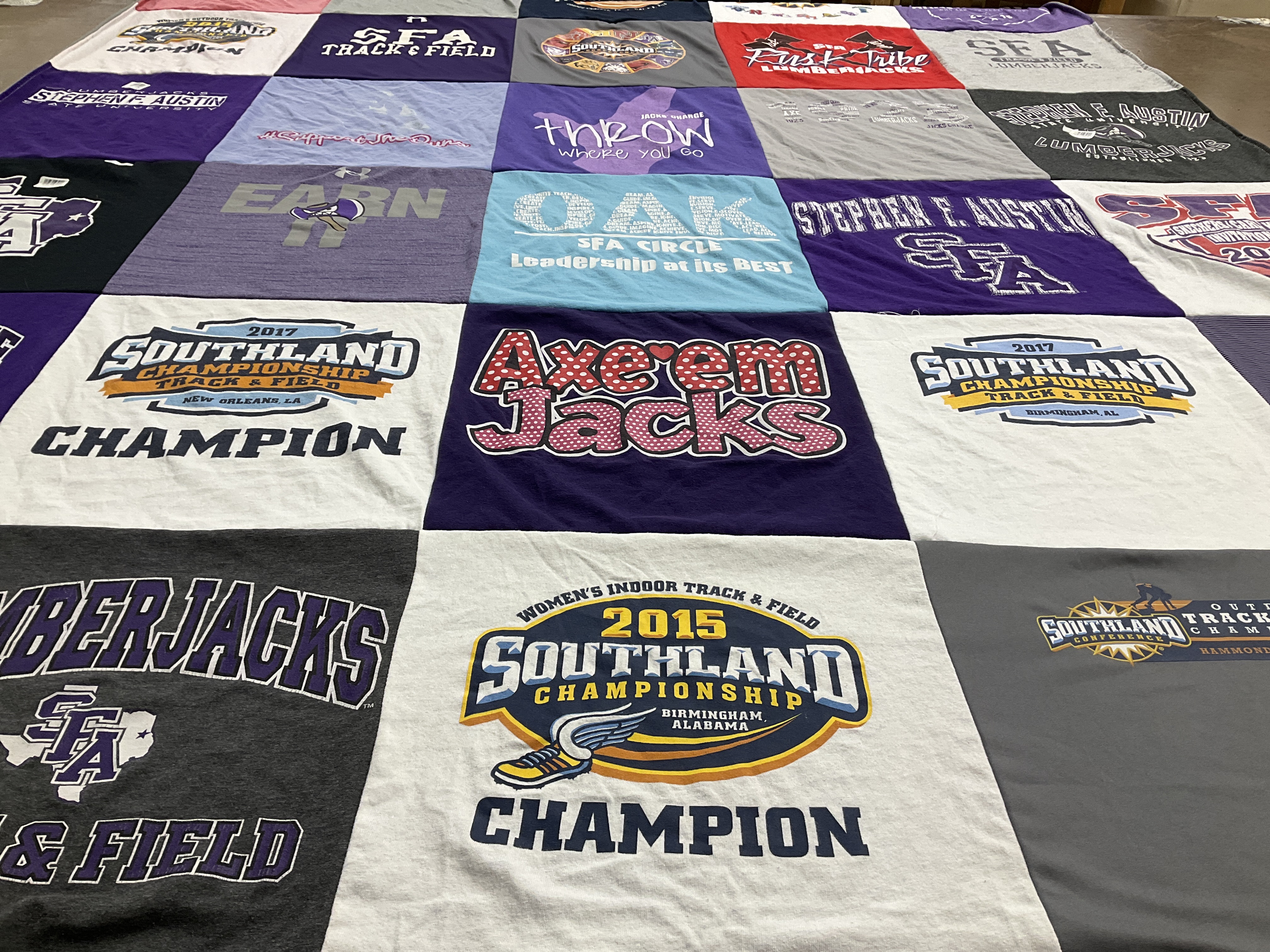 Custom Project Repat t-shirt quilt featuring shirts from stephen f. austin university.