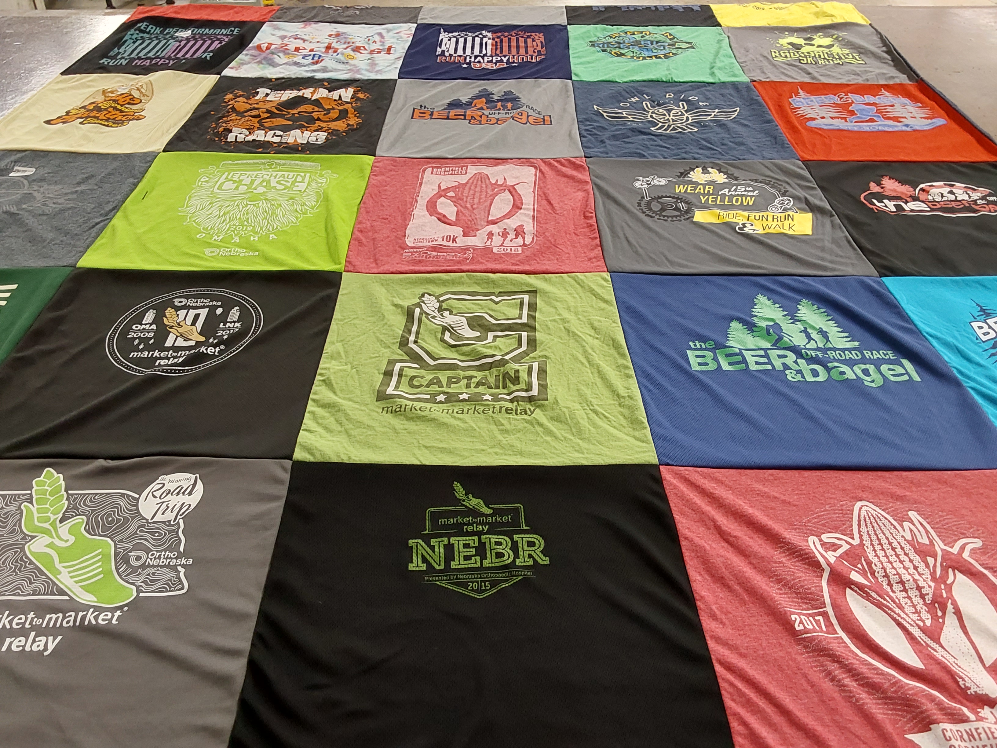 T-shirt quilt with running, events themes by Stephen from NE
