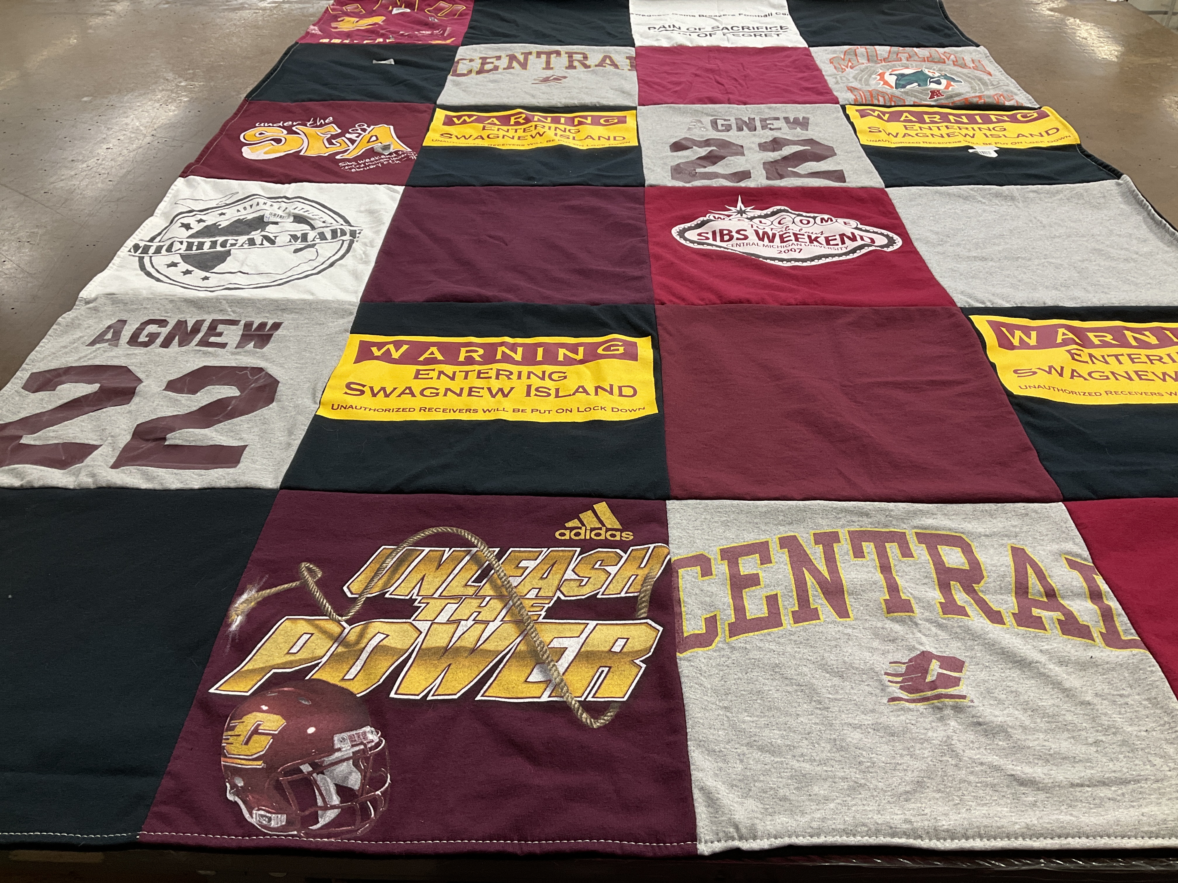 Custom Project Repat t-shirt quilt featuring shirts from central michigan university.