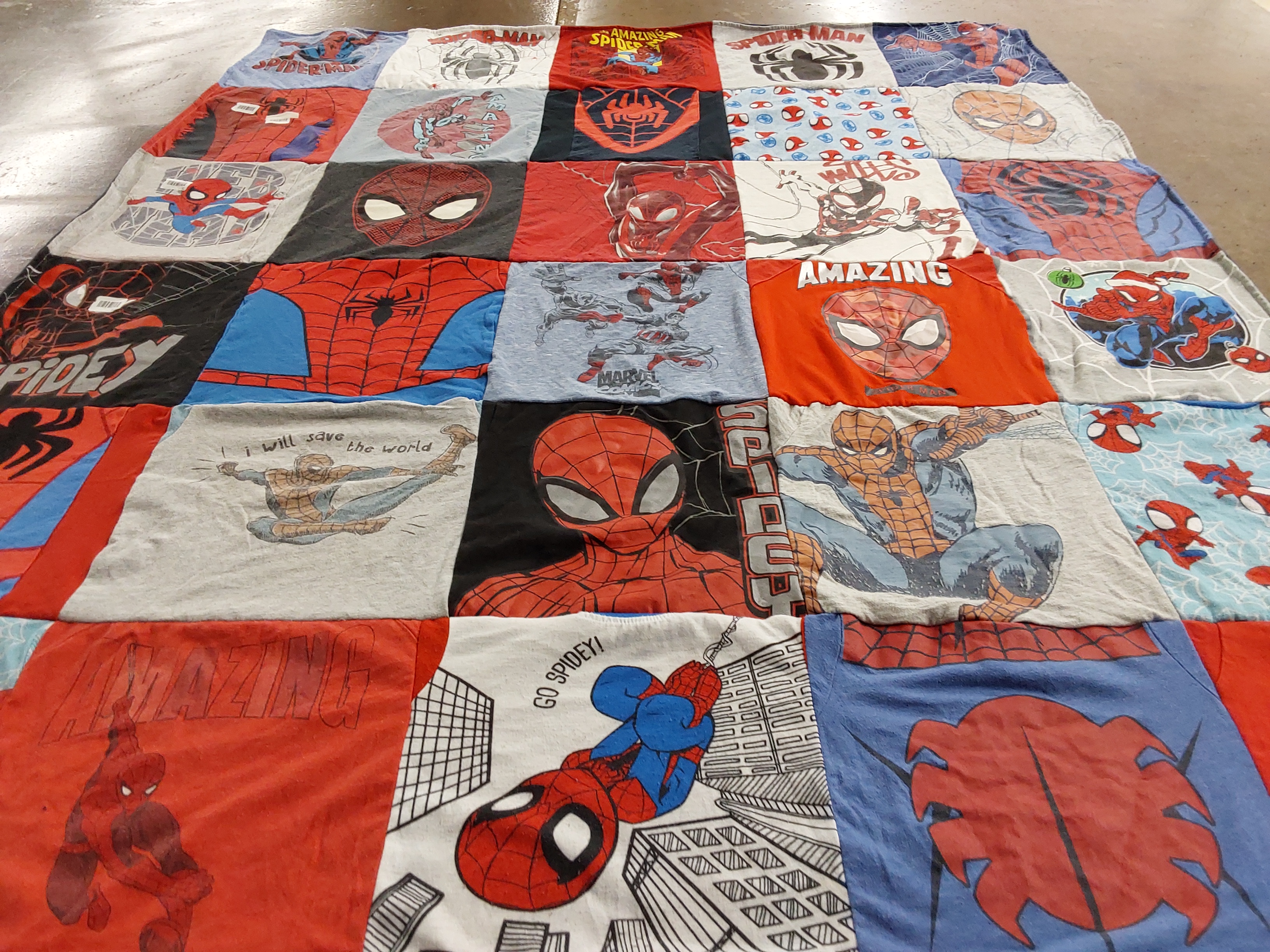 T-shirt quilt with comic books, superheroes themes by Nichole from HI