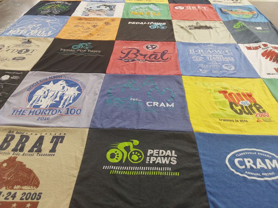 T-shirt quilt with cycling, charity events themes by James from TN