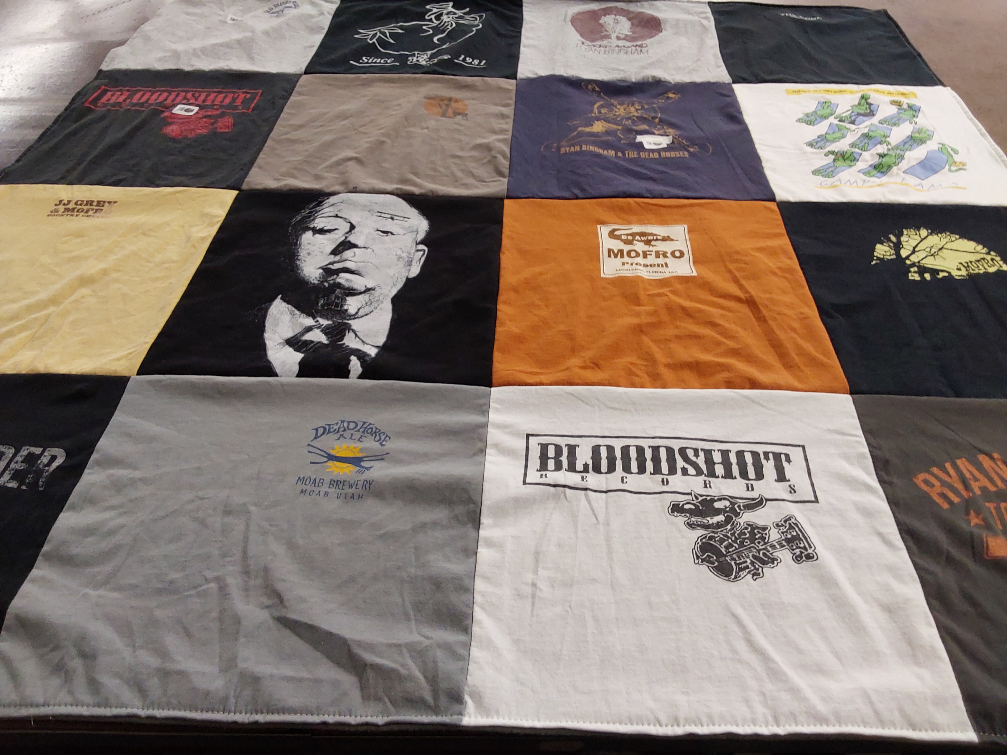 T-shirt quilt with music, breweries themes by Amber from UT