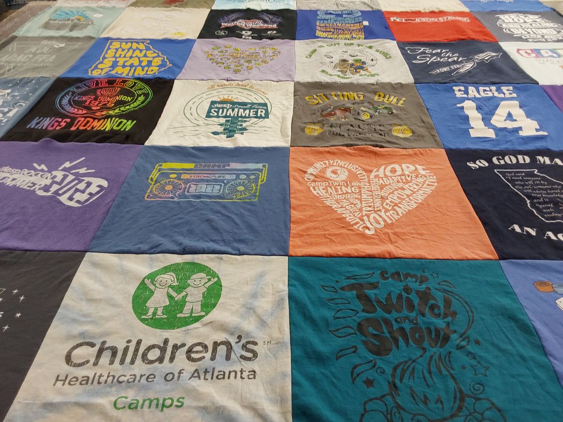 T-shirt quilt with camps, children's healthcare themes by Jennifer from VA