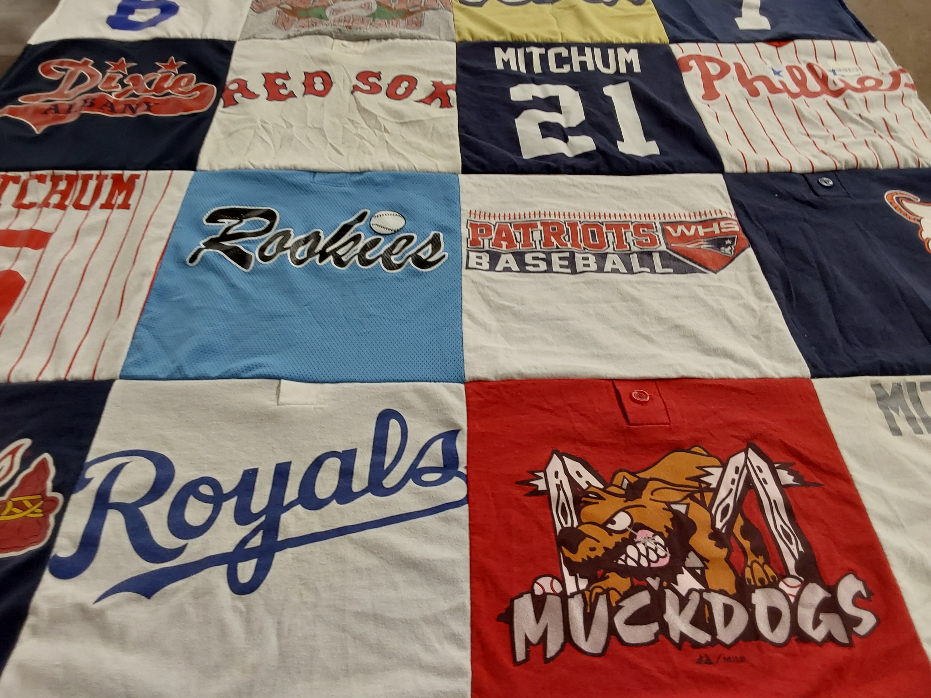 Custom Project Repat t-shirt quilt featuring shirts from wheeling high school.
