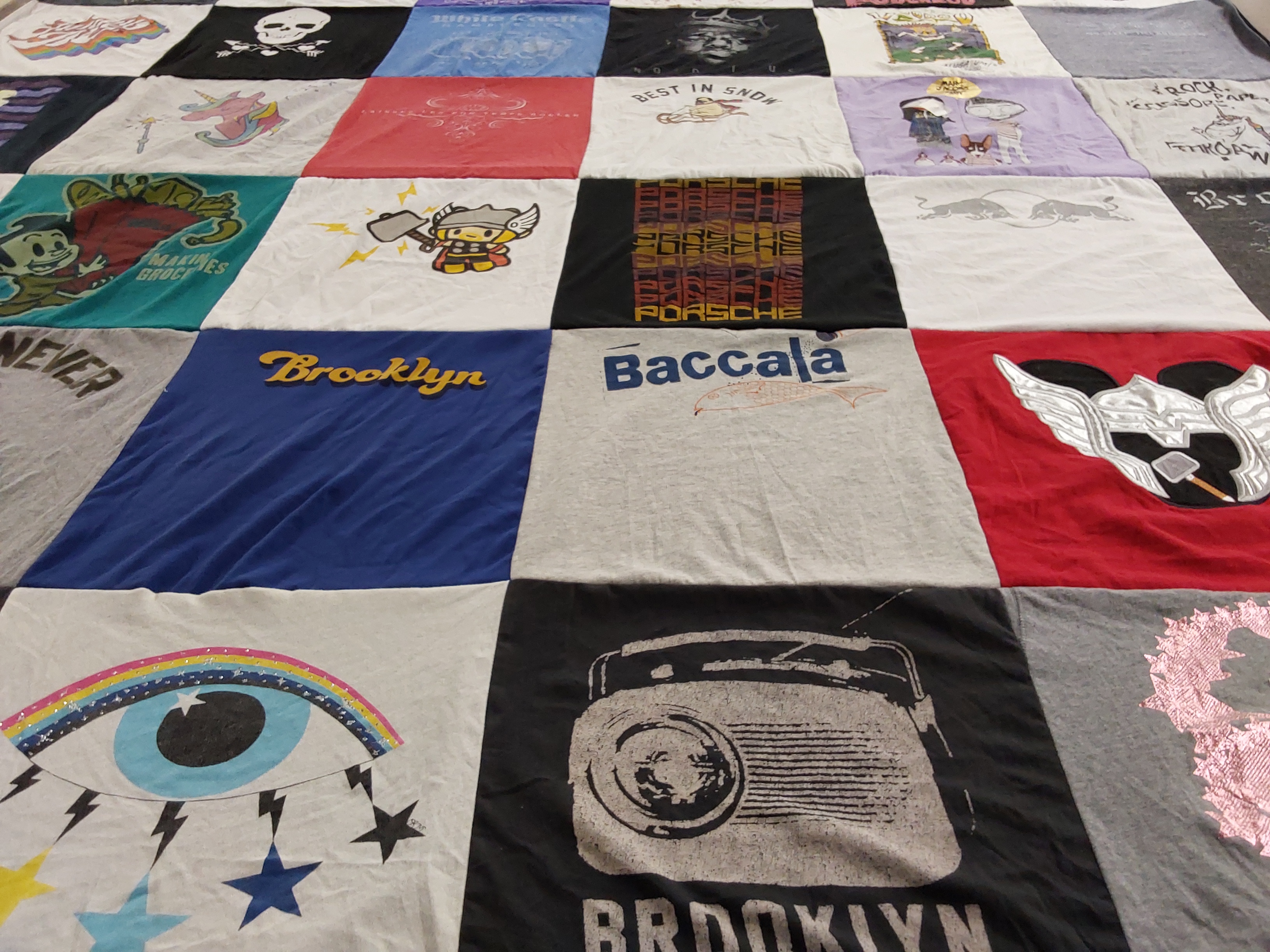 T-shirt quilt with graphic design, pop culture themes by Jessica from LA