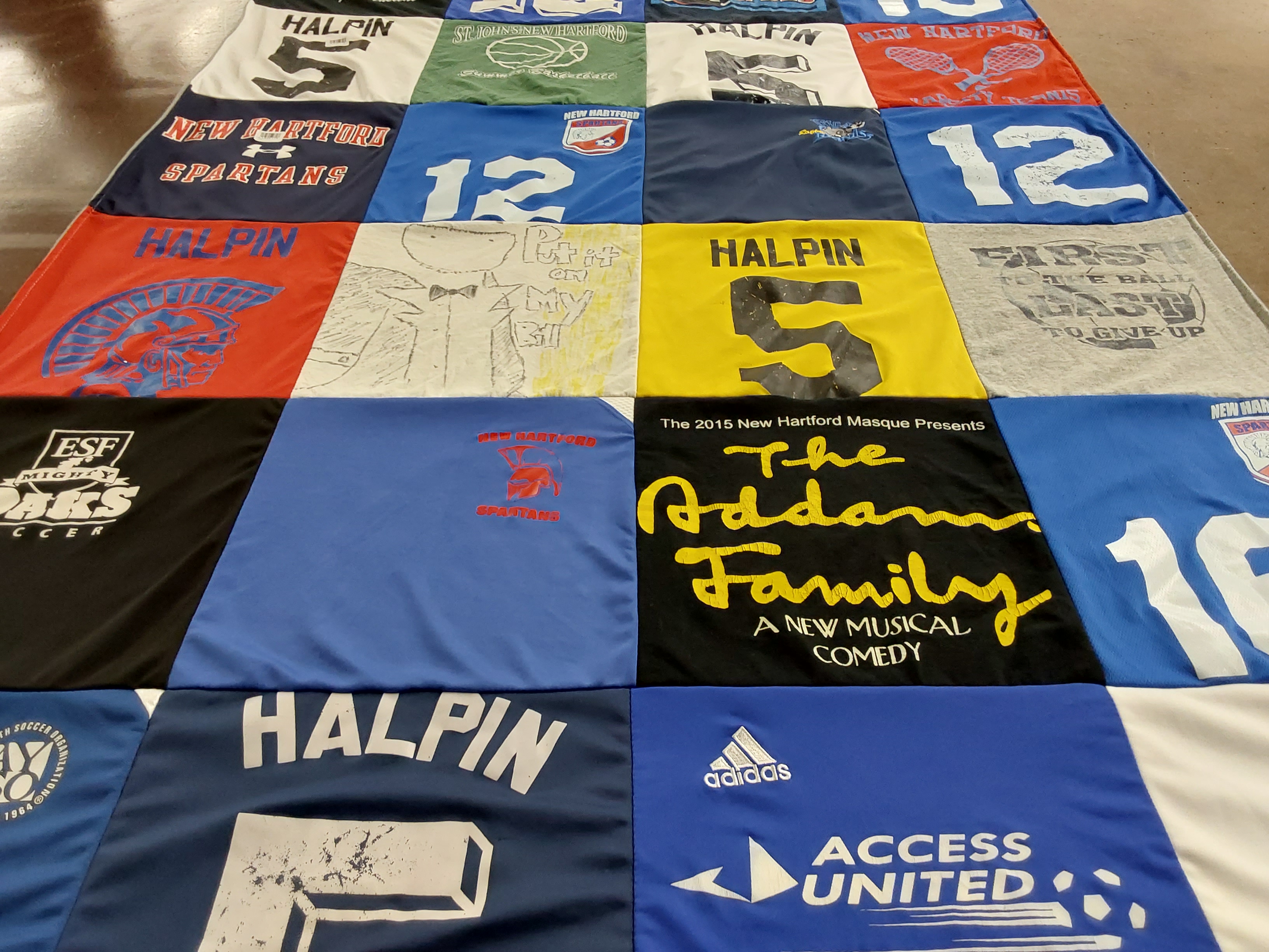 Custom Project Repat t-shirt quilt featuring shirts from st. john's new hartford, esf mighty oaks college.