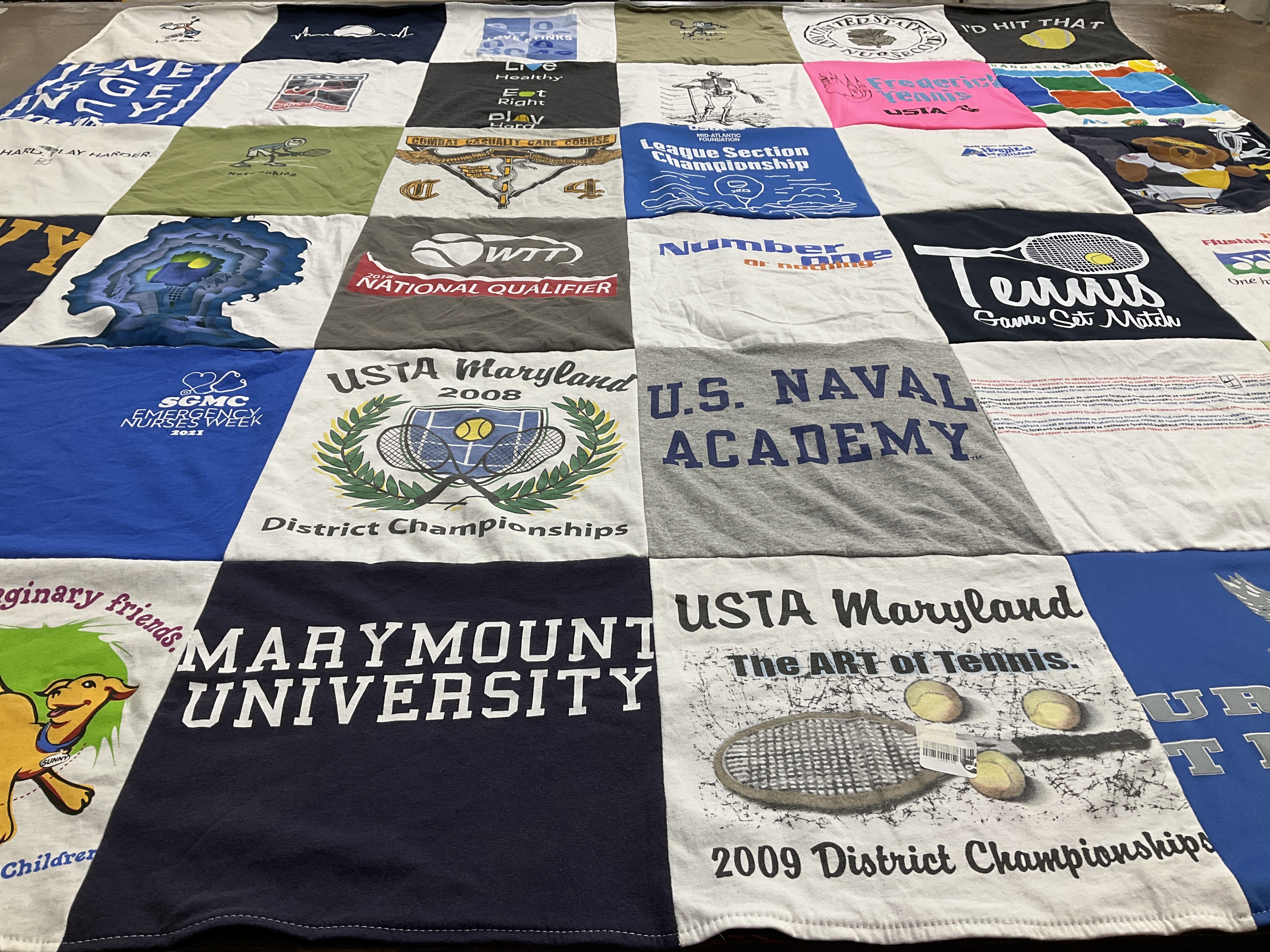 Custom Project Repat t-shirt quilt featuring shirts from marymount university, u.s. naval academy.