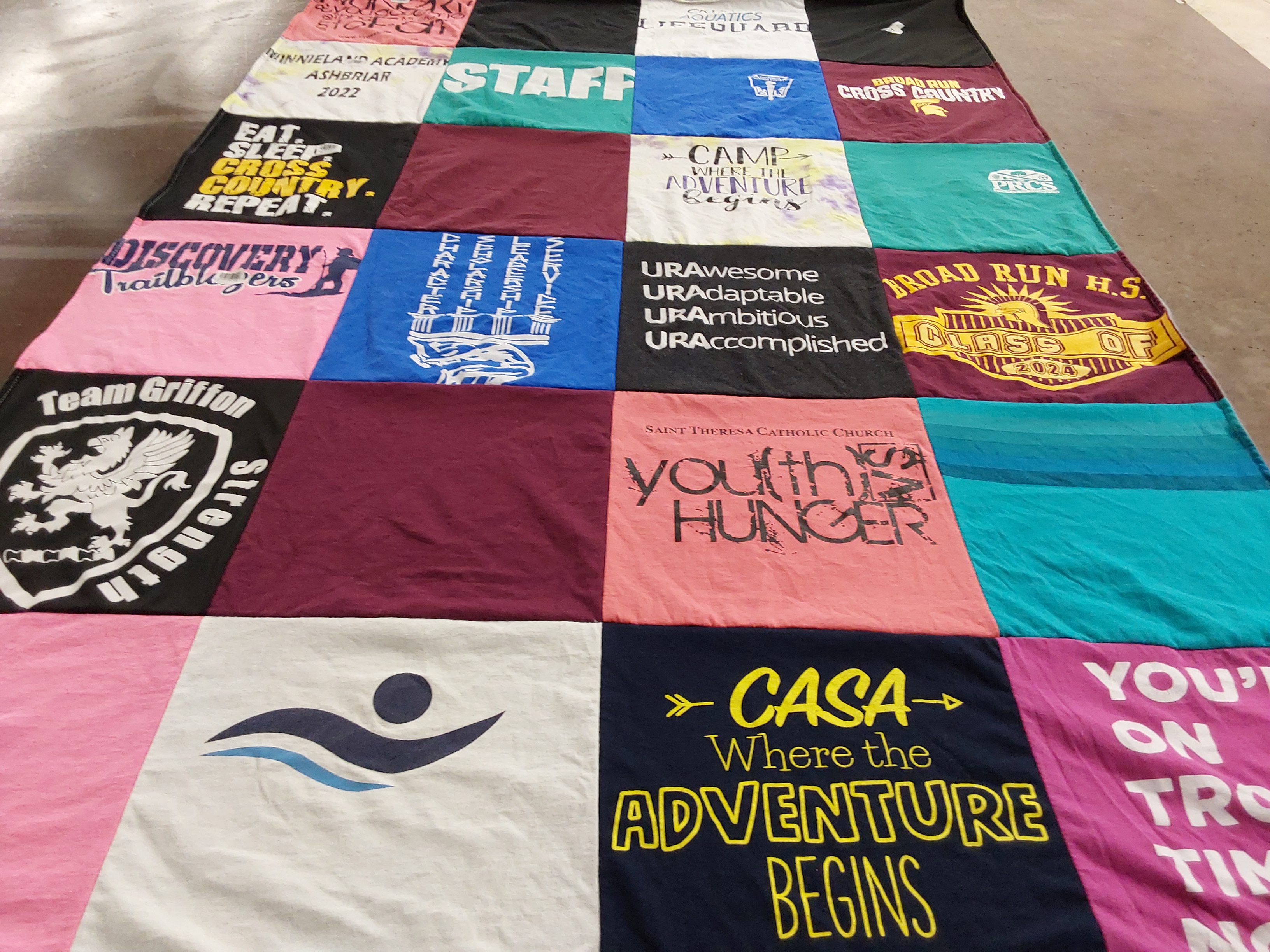 Custom Project Repat t-shirt quilt featuring shirts from broad run high school.
