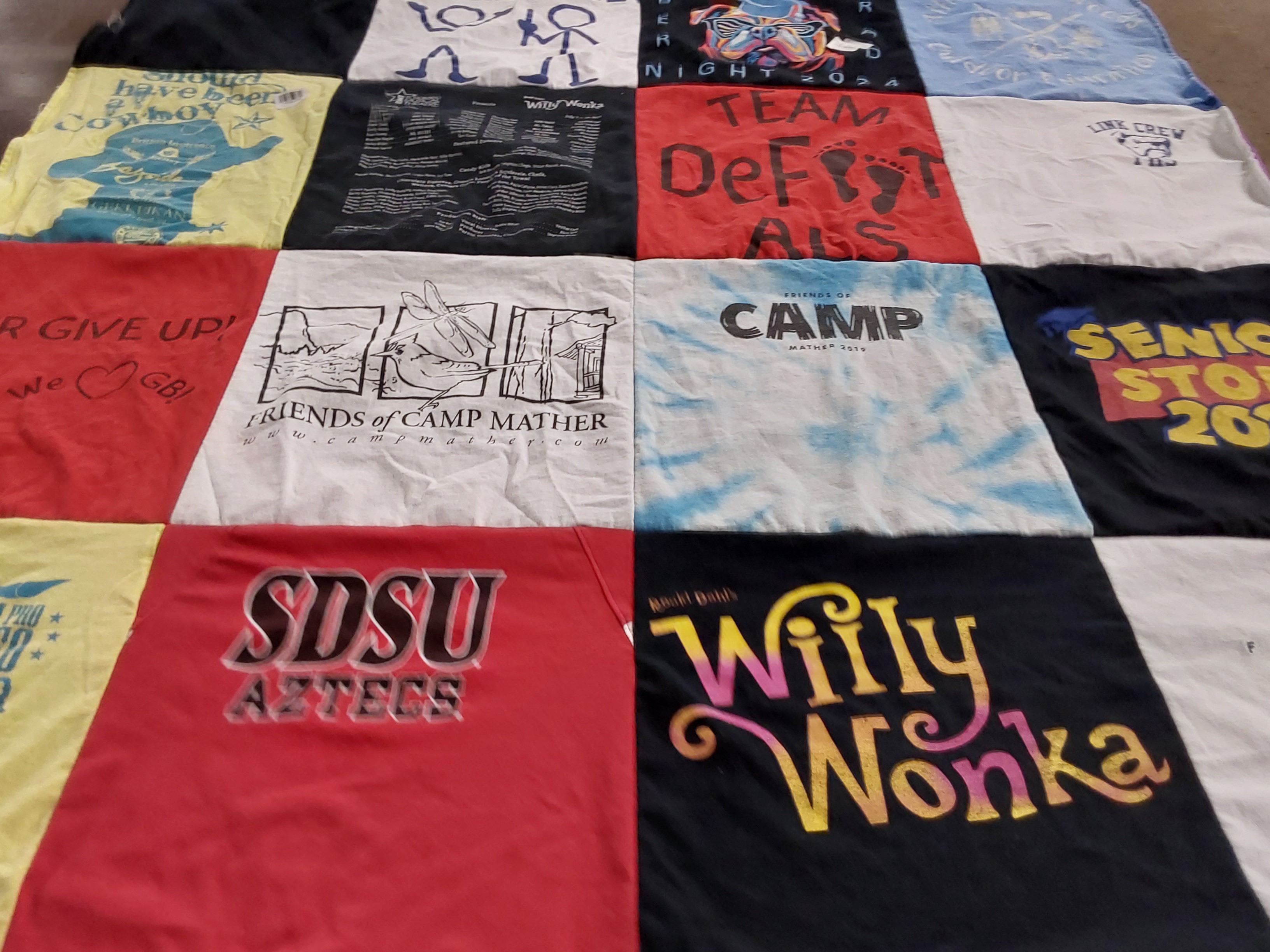 Custom Project Repat t-shirt quilt featuring shirts from san diego state university.