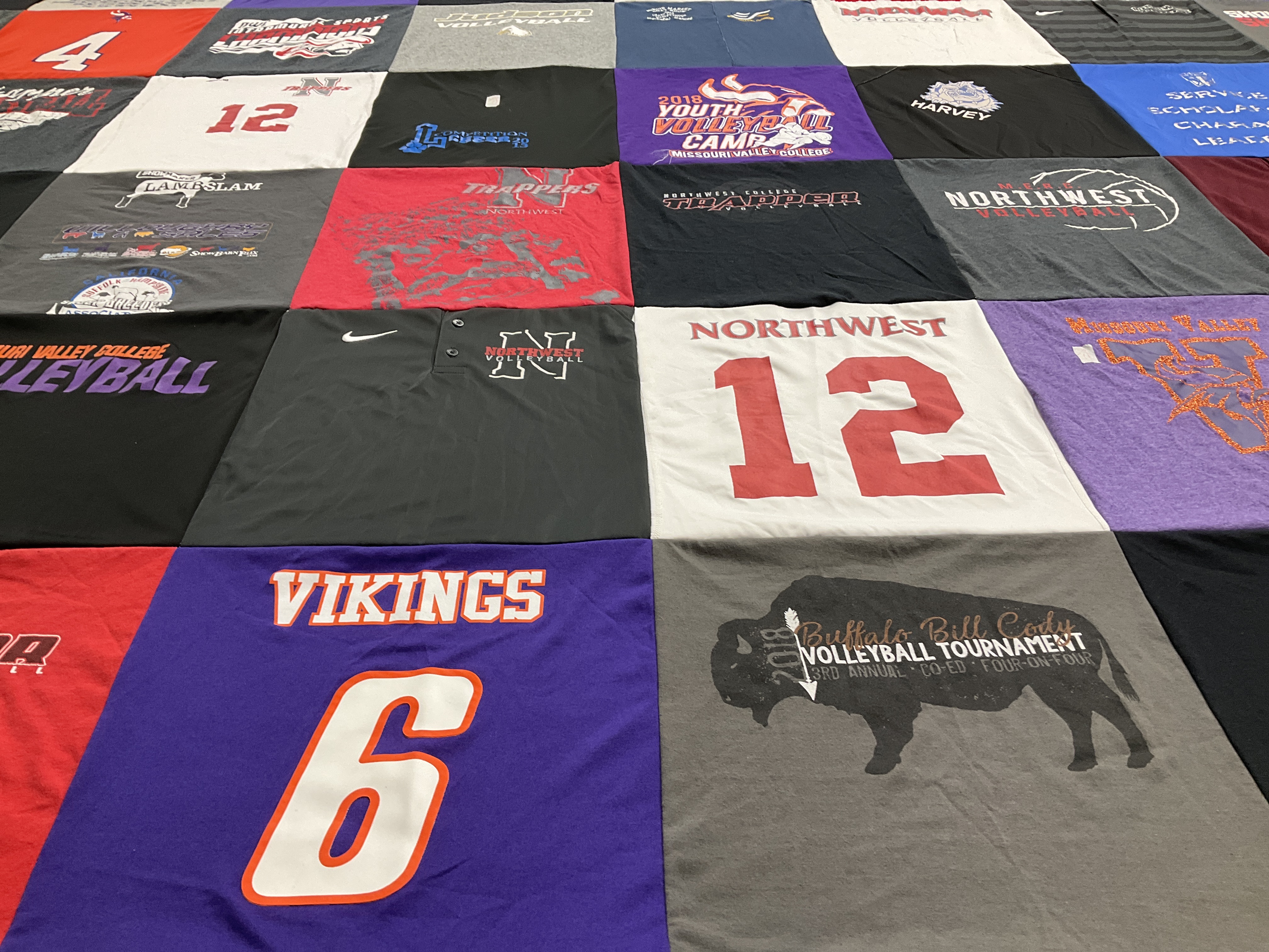 Custom Project Repat t-shirt quilt featuring shirts from northwest college.