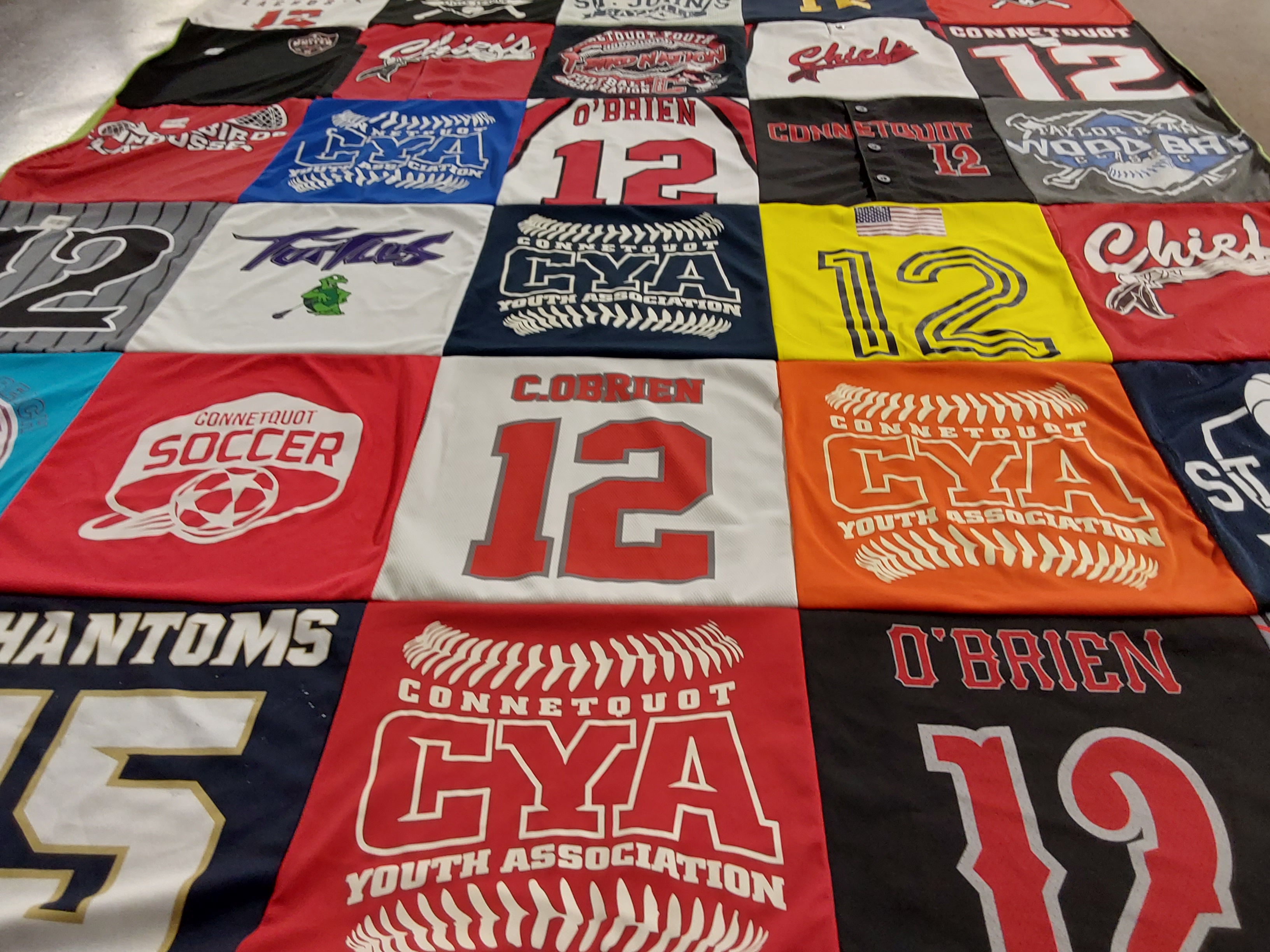 T-shirt quilt with sports, soccer themes by Cole from NY
