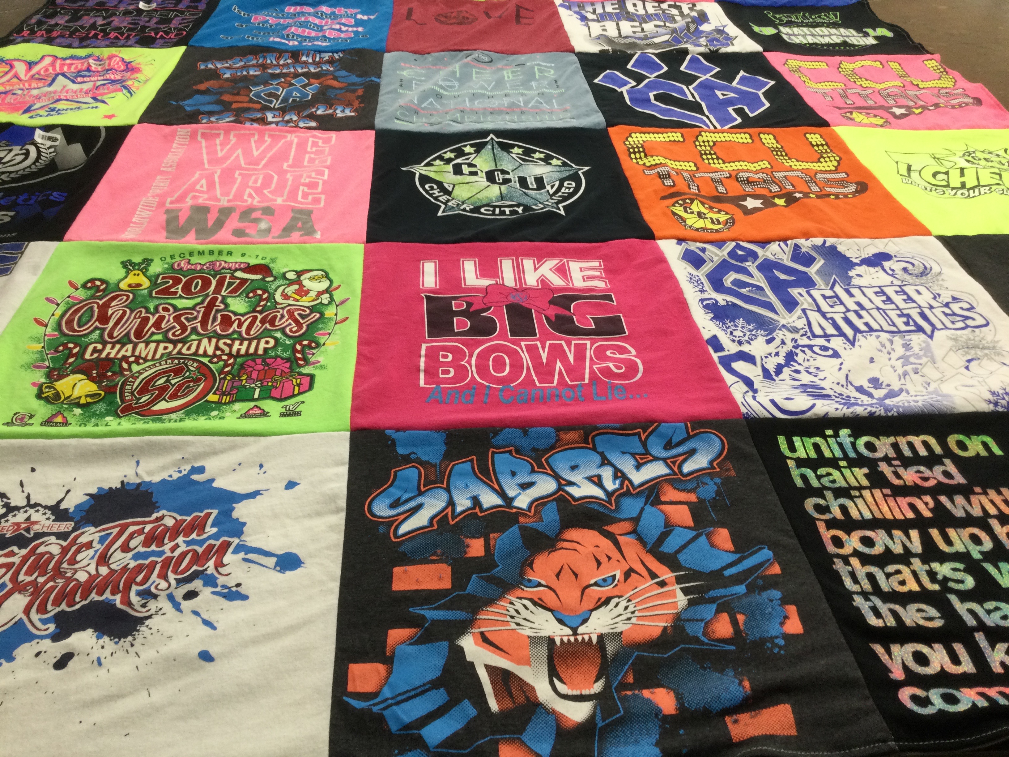 T-shirt quilt featuring sabr by Lindsi from AR