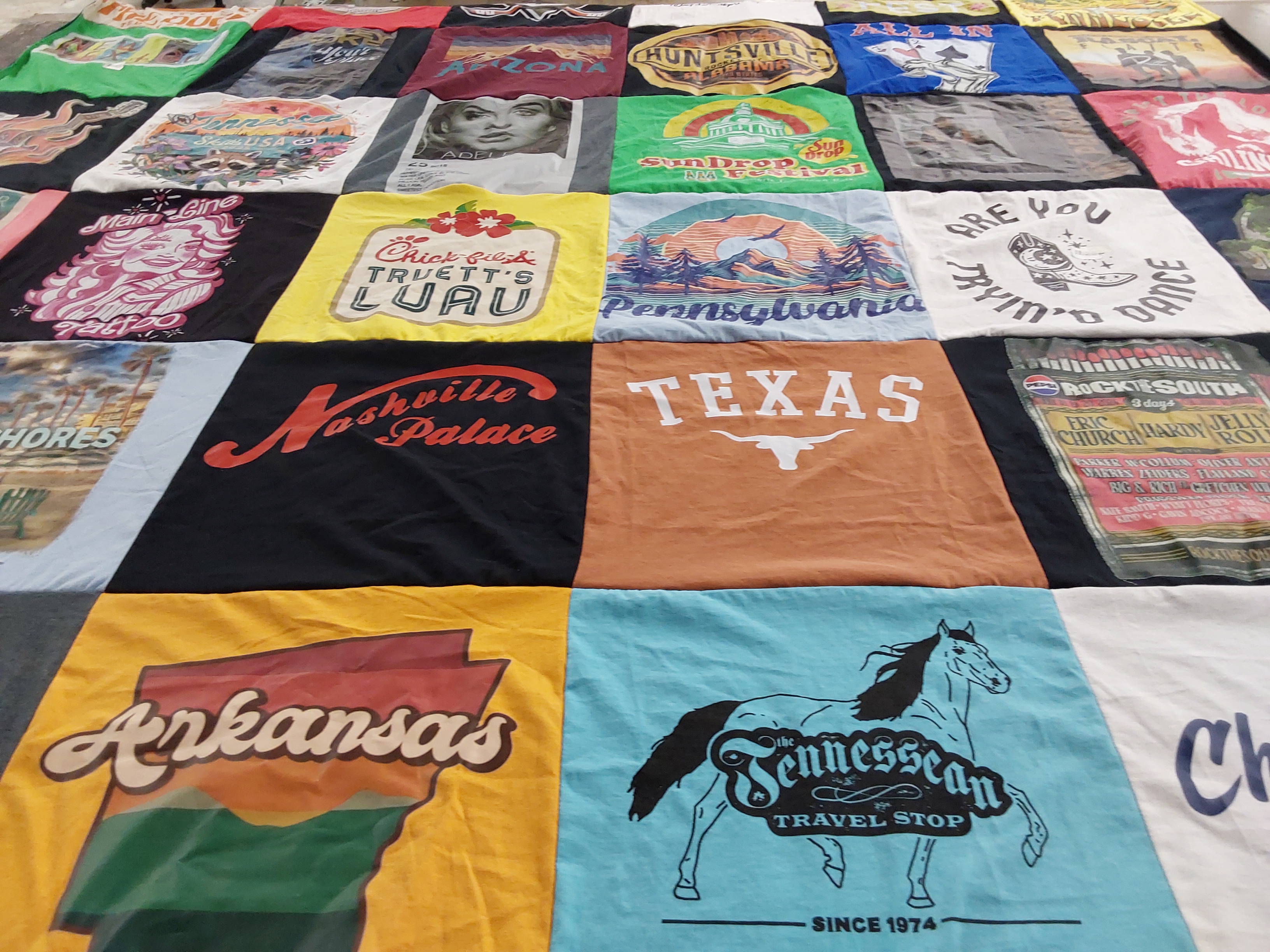 T-shirt quilt with travel, music themes by Kristan from TN