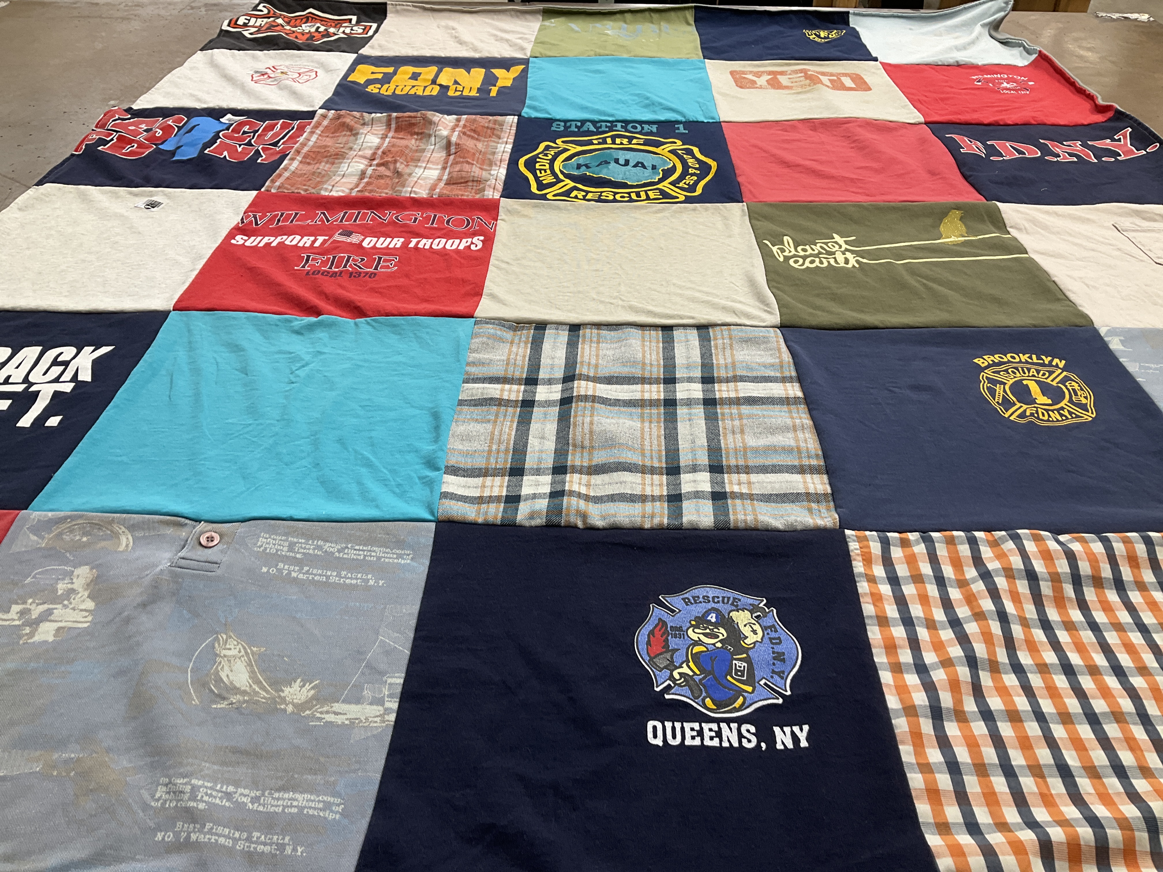 T-shirt quilt with firefighting, supporting troops themes by Jody from MA