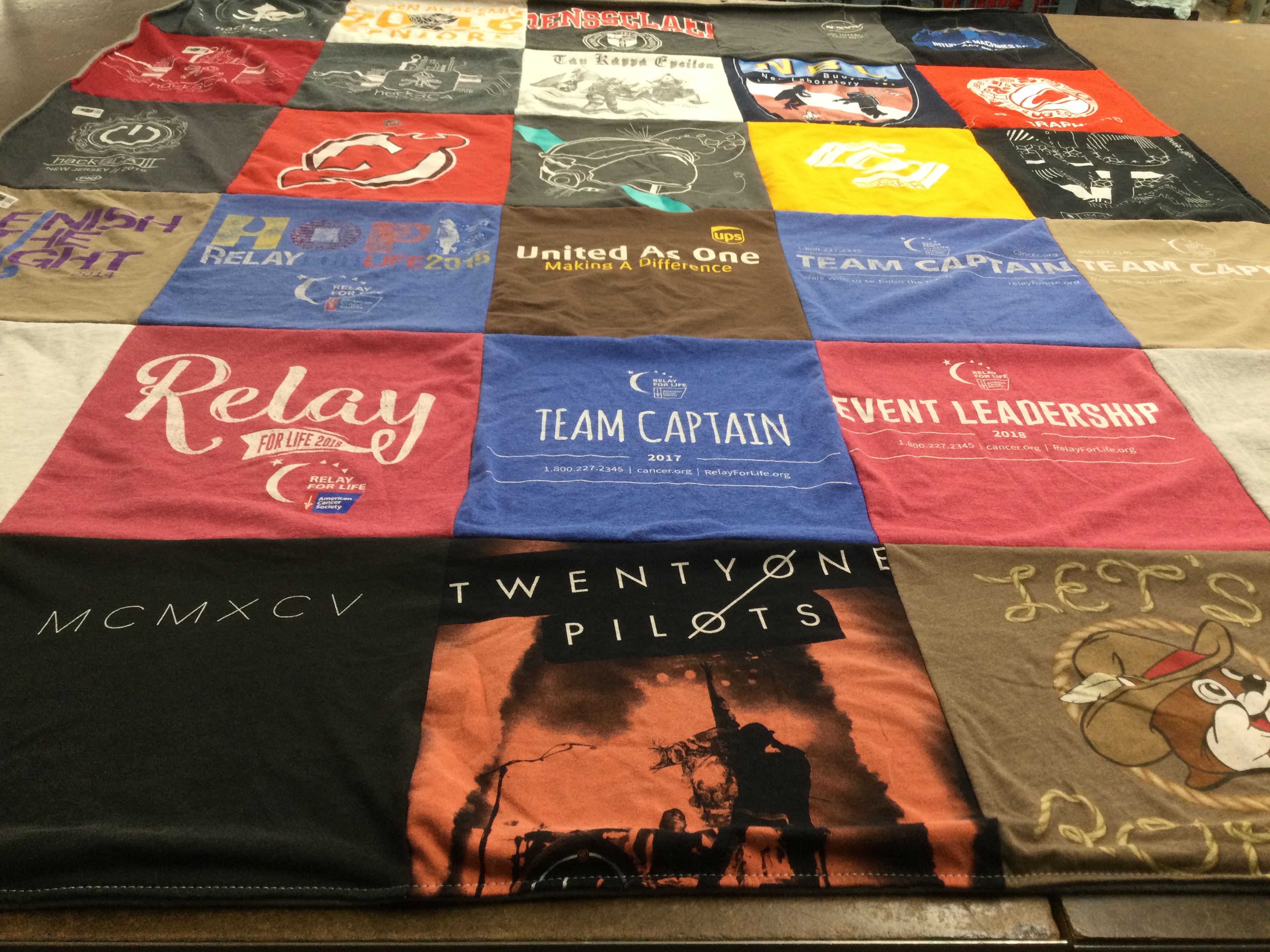T-shirt quilt with music, community service themes by Lillian from TX
