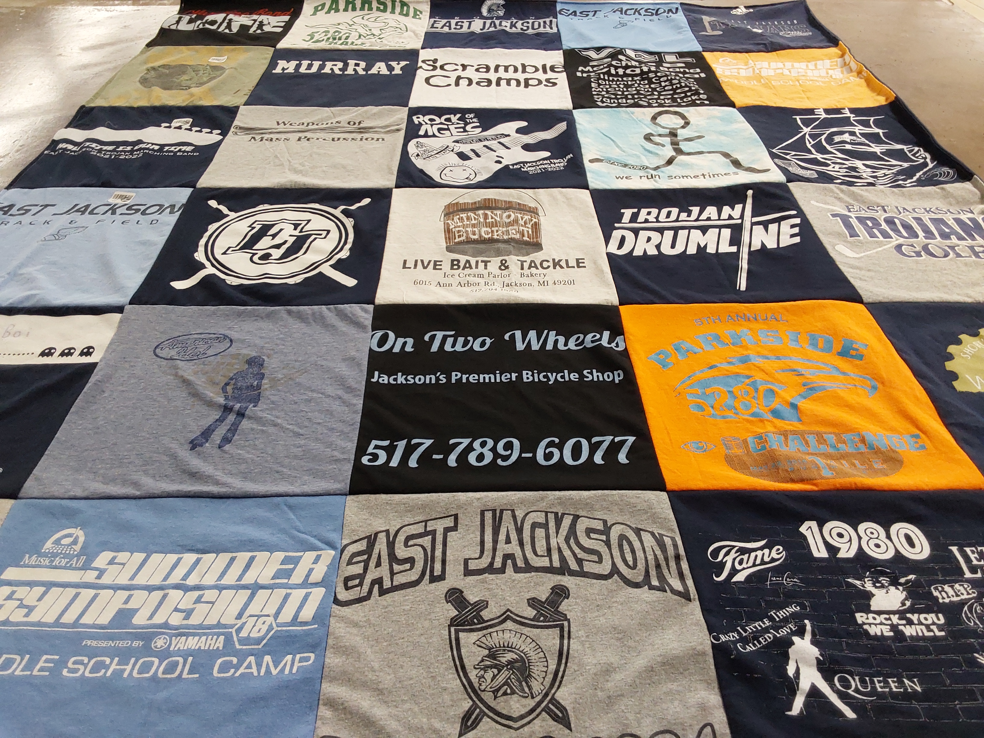 Custom Project Repat t-shirt quilt featuring shirts from east jackson high school.