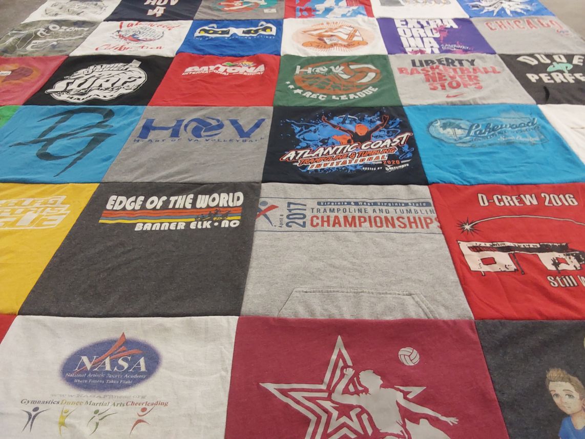 T-shirt quilt with volleyball, cheerleading themes by Annie from VA