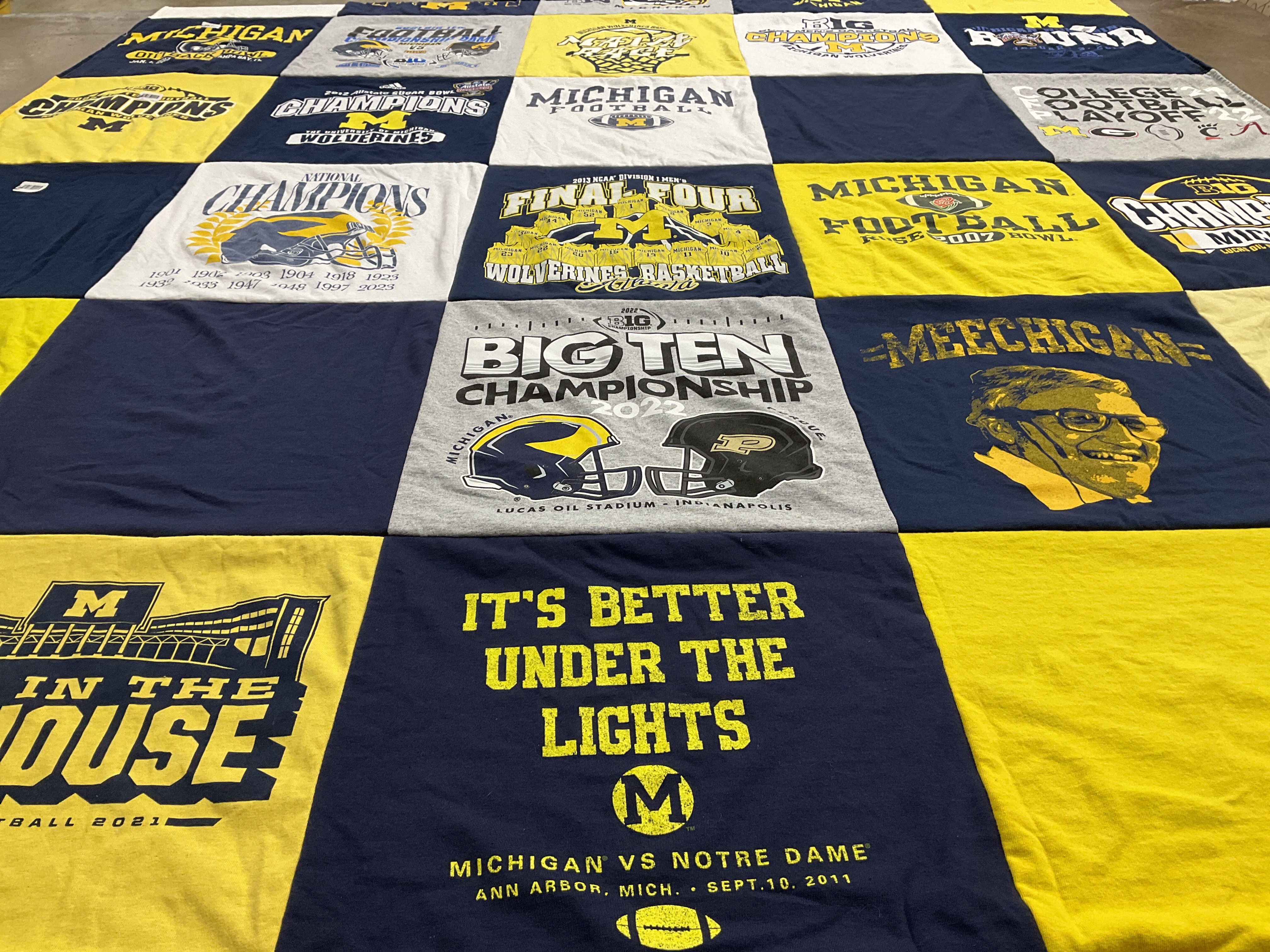 Custom Project Repat t-shirt quilt featuring shirts from university of michigan.