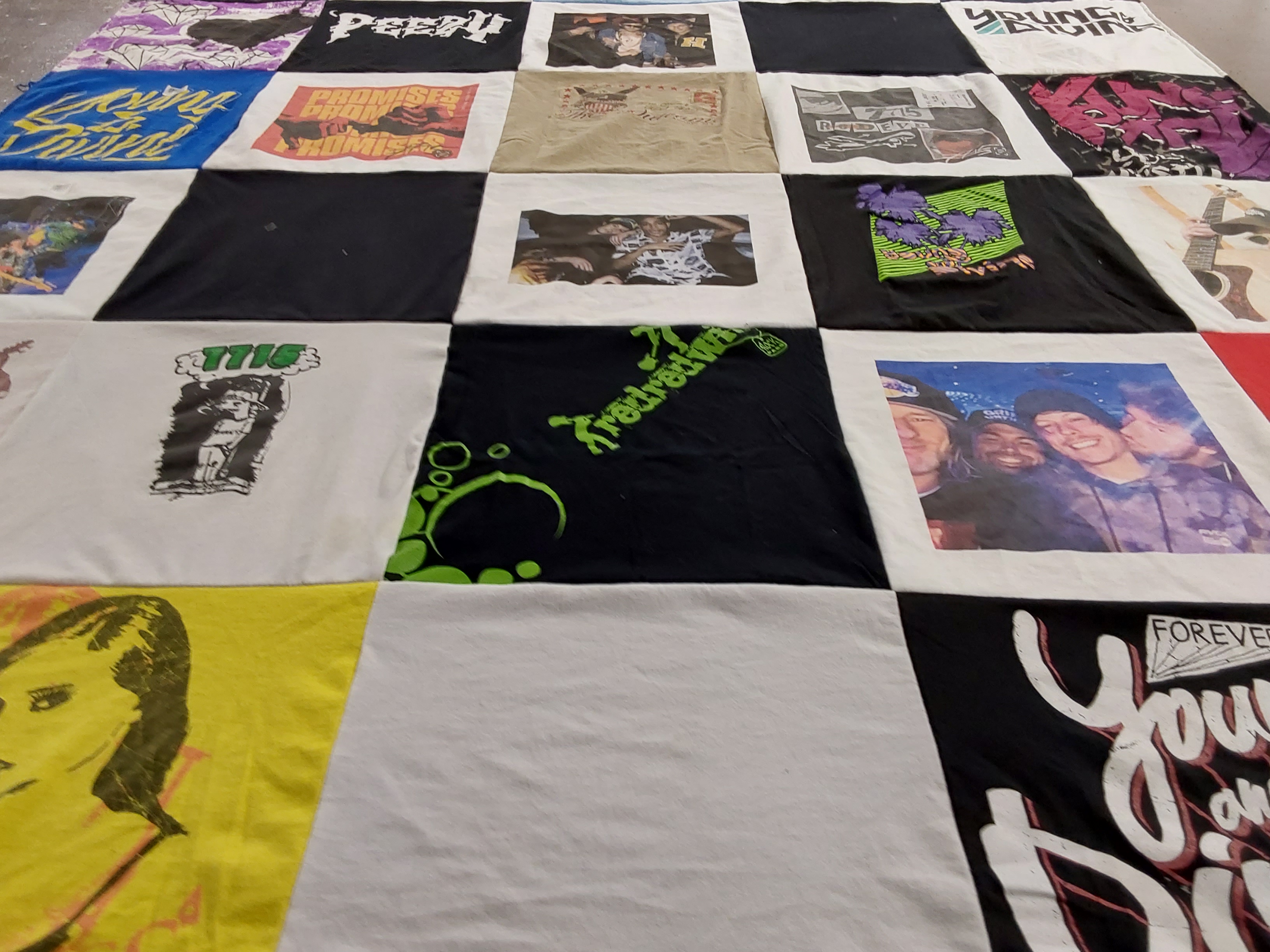 T-shirt quilt with music, art themes by Audrey from CA
