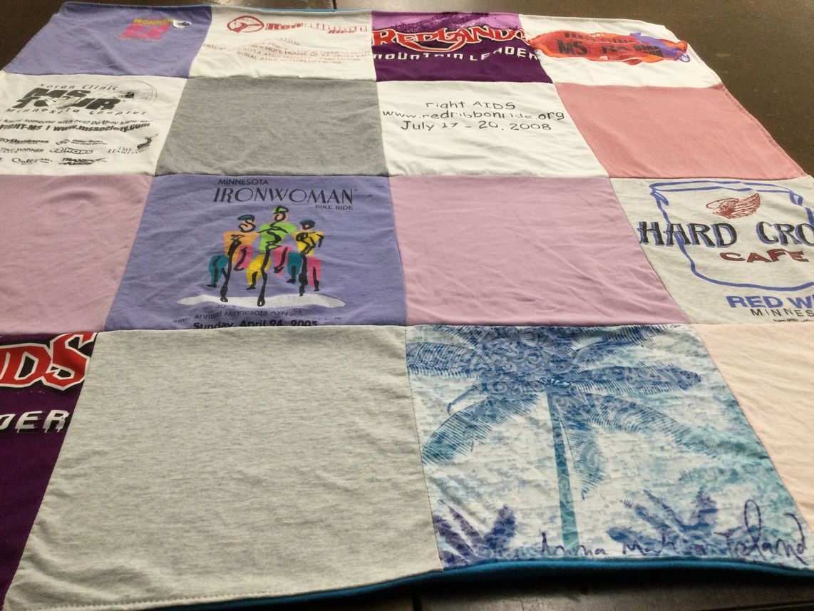 T-shirt quilt with biking, hiking themes by Tina from MN