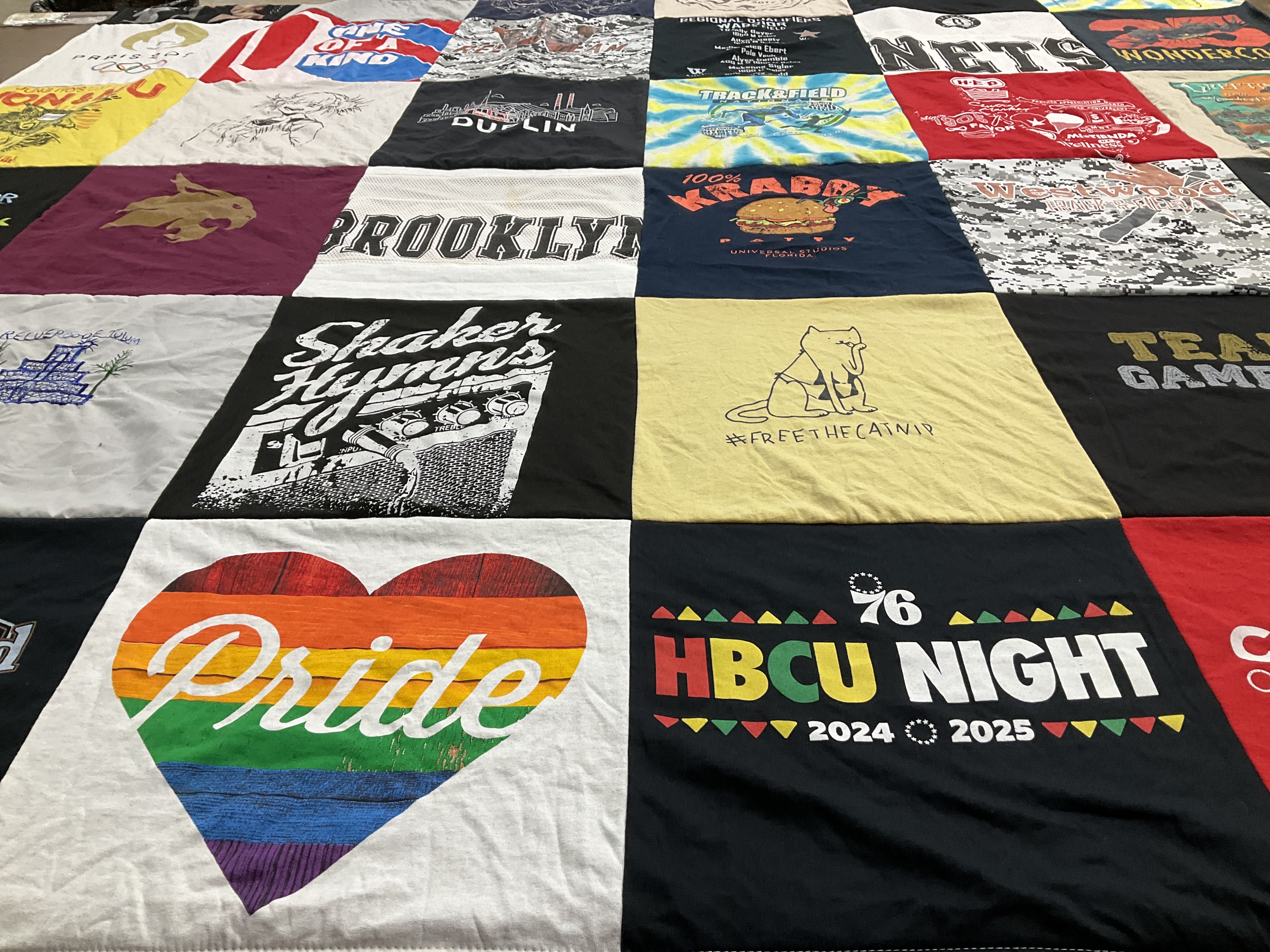 Custom Project Repat t-shirt quilt highlighting hbcu, pride themes.