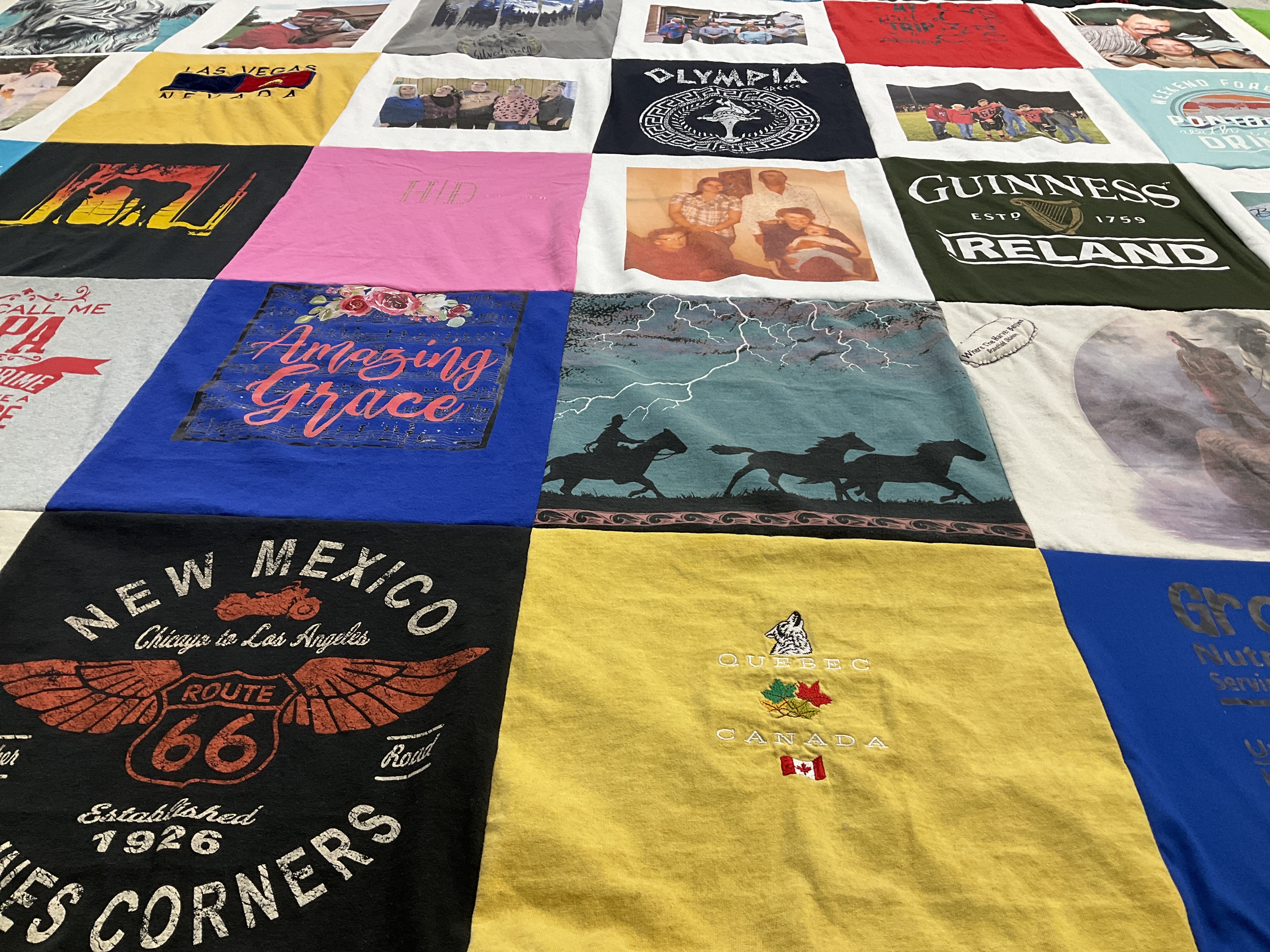 T-shirt quilt with travel, photography themes by Debora from OK