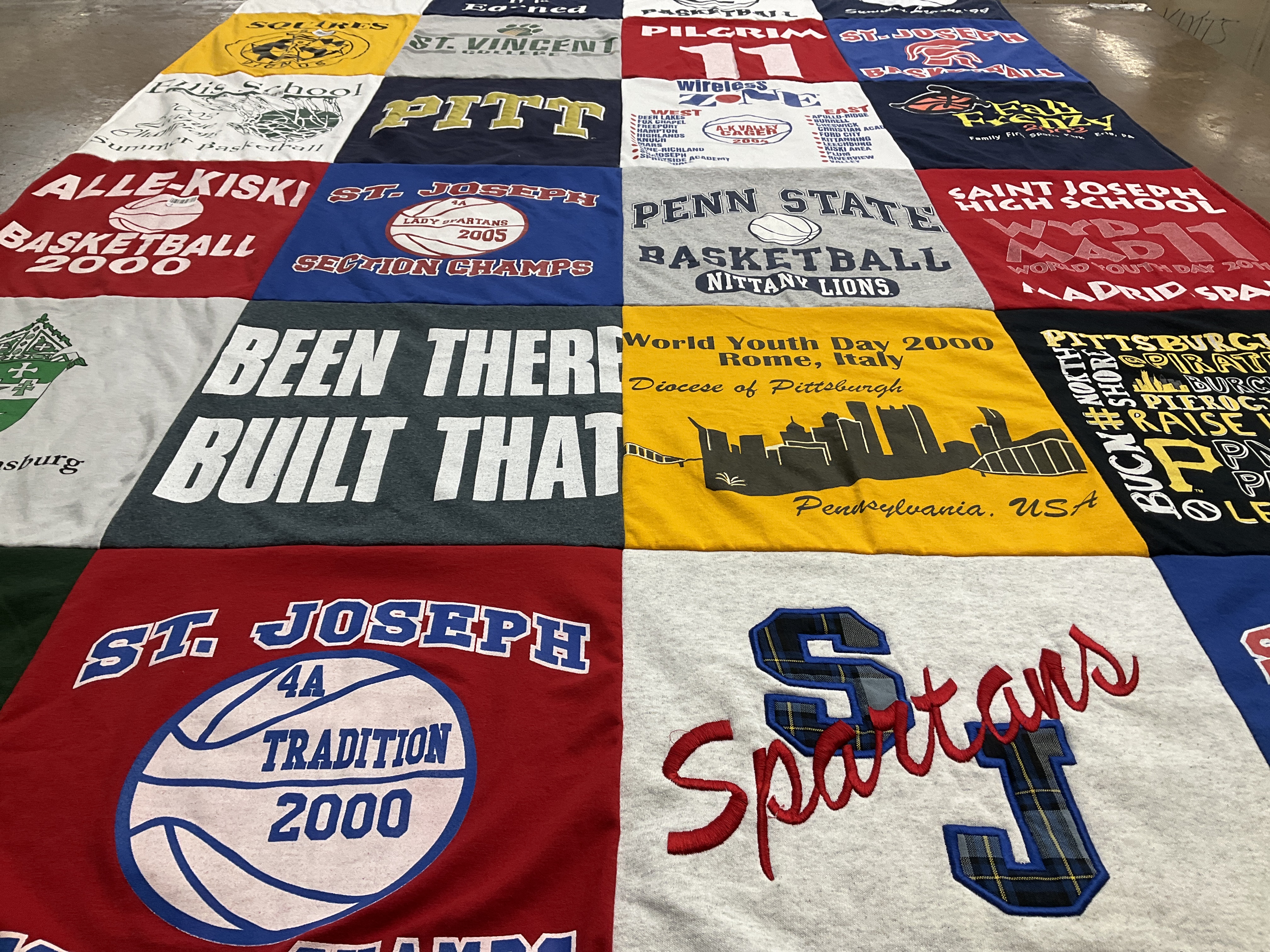 Custom Project Repat t-shirt quilt featuring shirts from alle-kiski high school, penn state university.