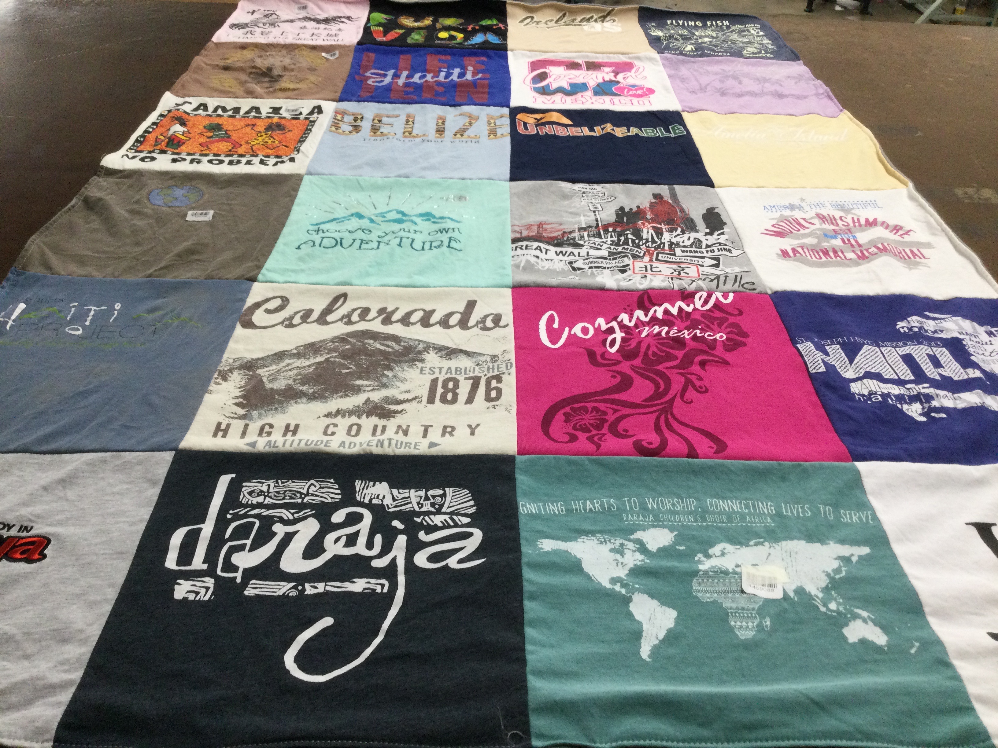 T-shirt quilt with travel, adventure themes by Brittany from LA