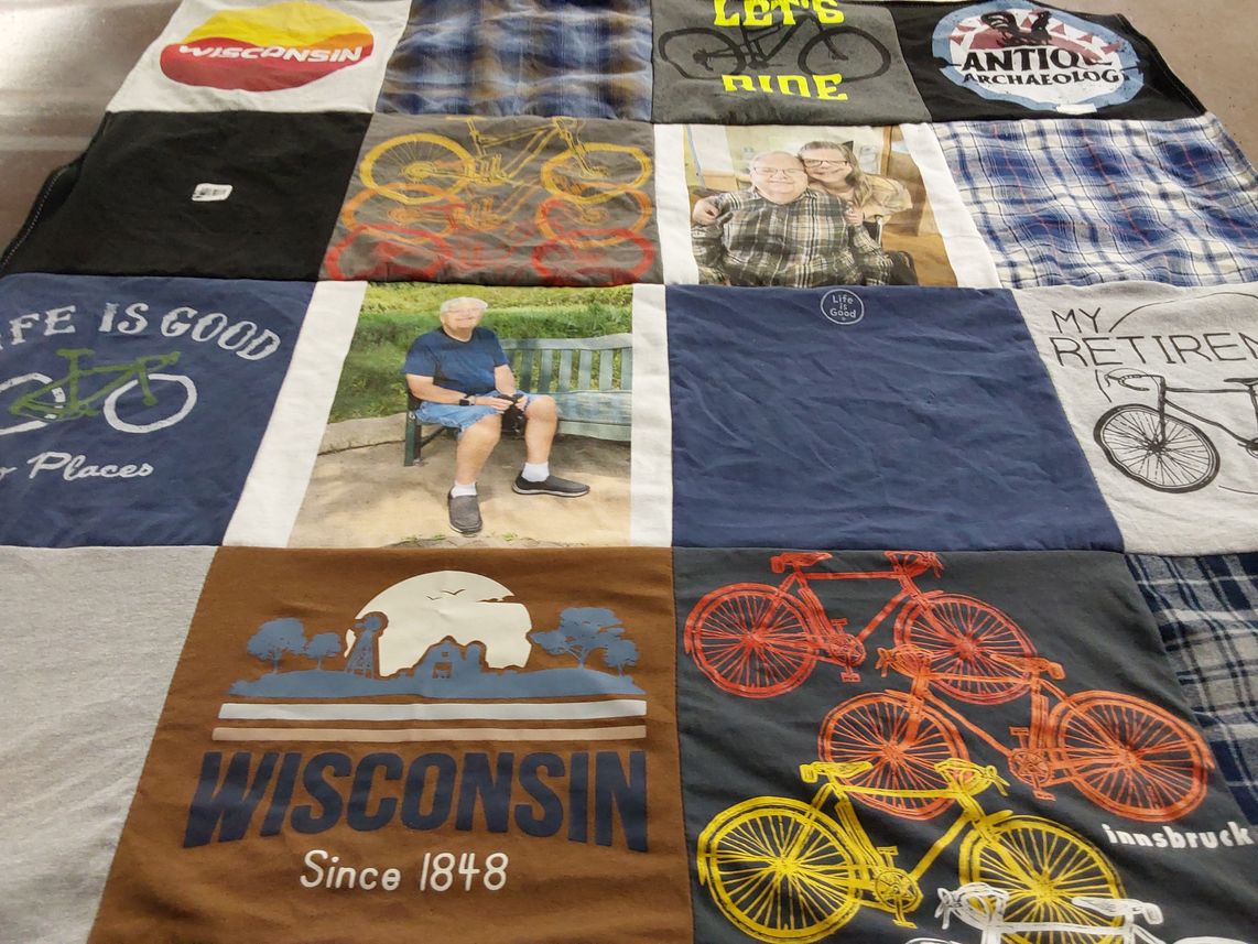 T-shirt quilt with cycling, photography themes by Sharon from WI