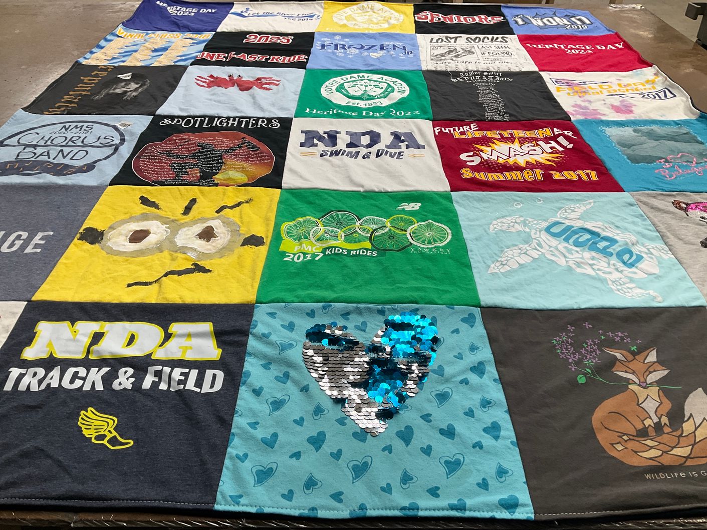 T-shirt quilt featuring notre dame academy track and field by Therese from MA