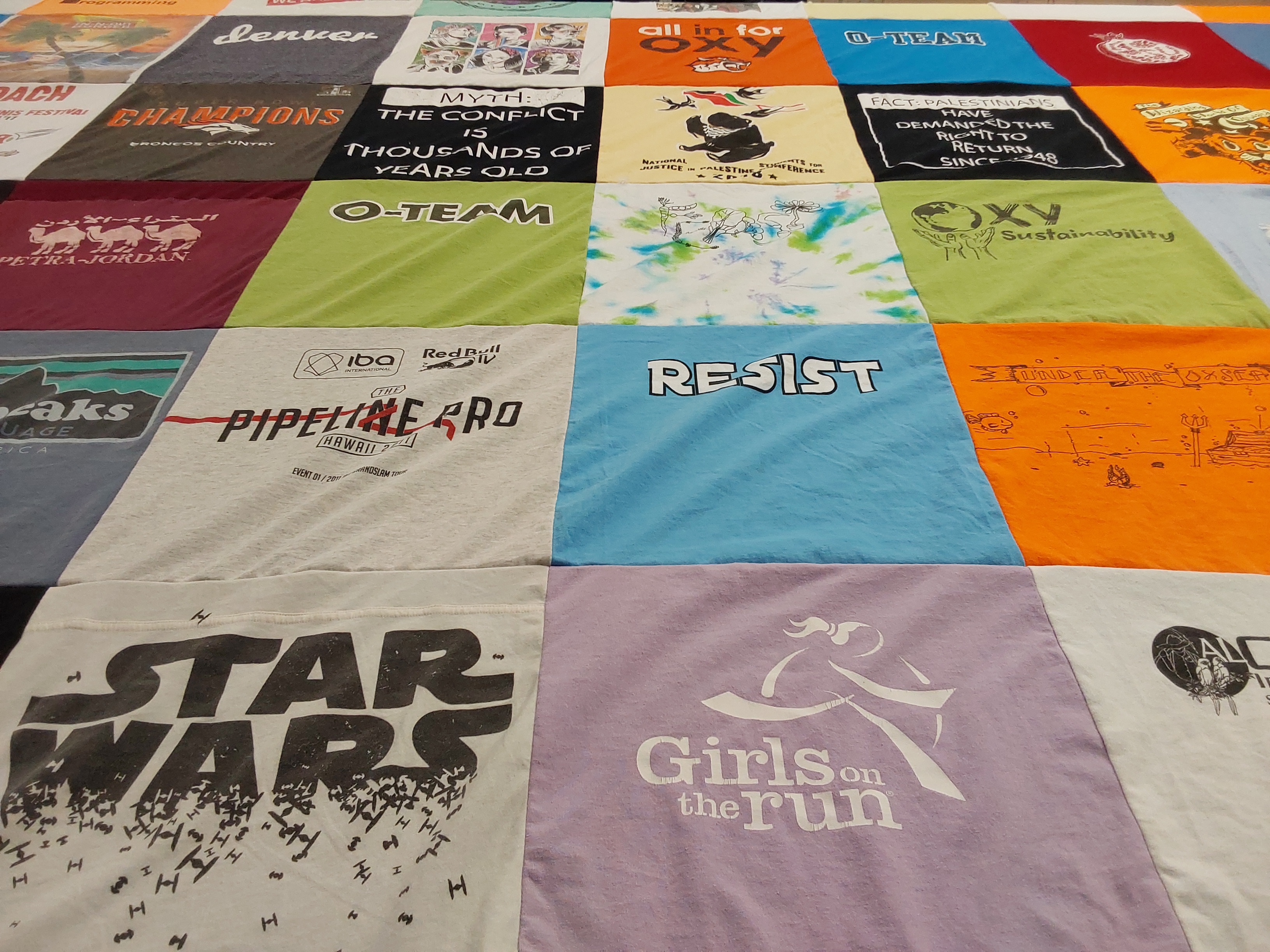 T-shirt quilt featuring o-team by Lana from CO